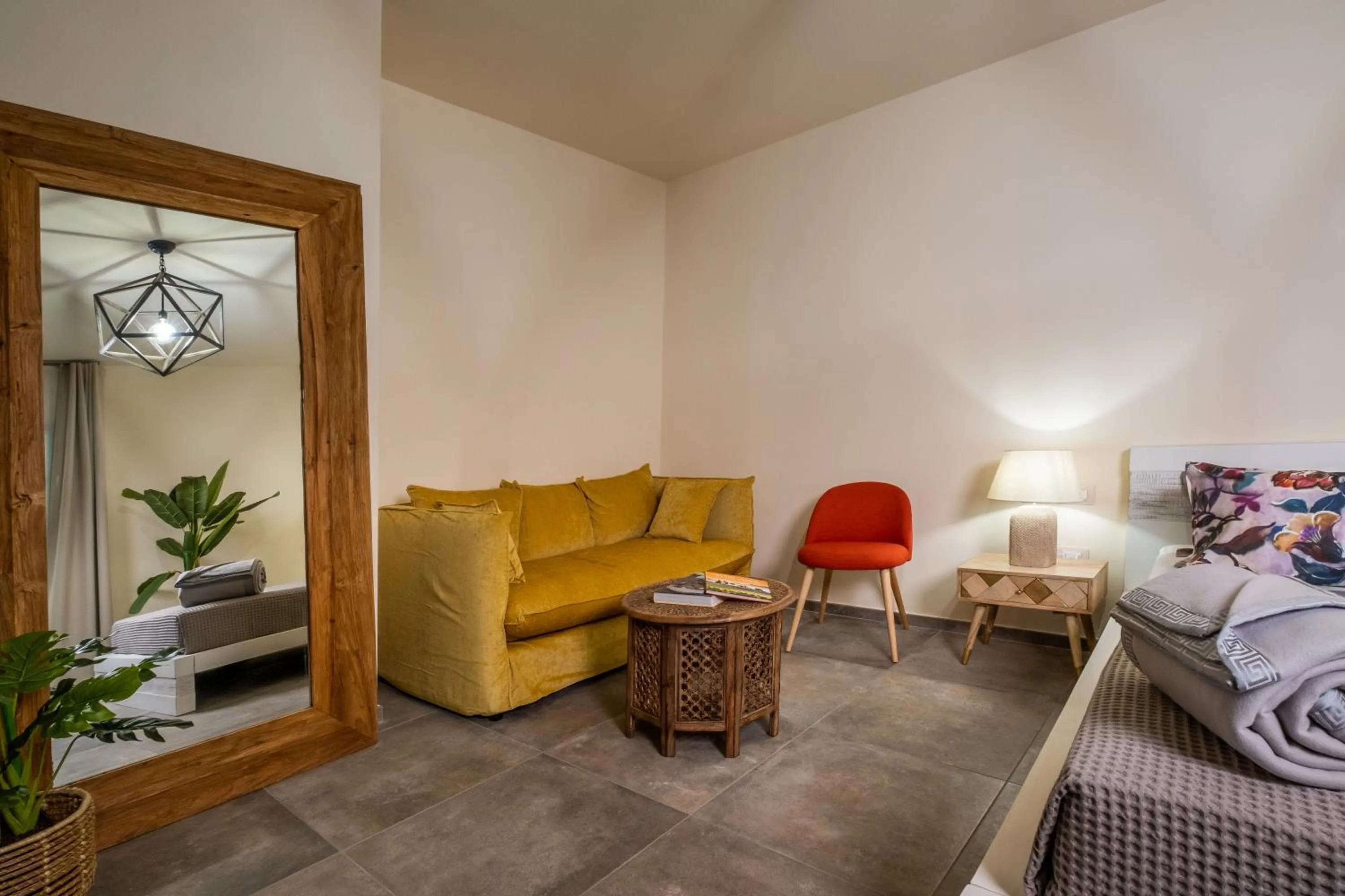 Seating area, Bed in Relais San Baio