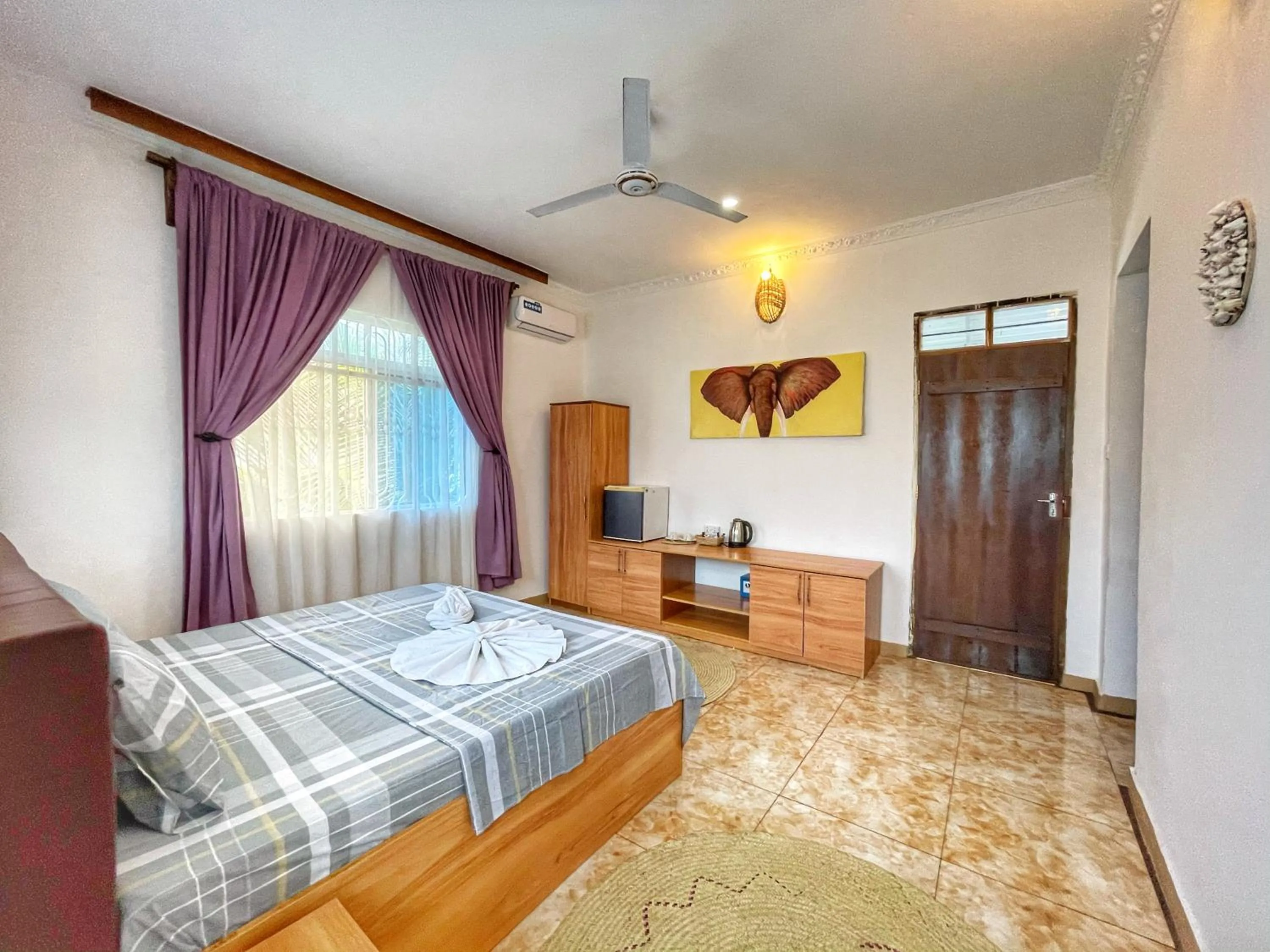 Bed in Max Hotel Nungwi