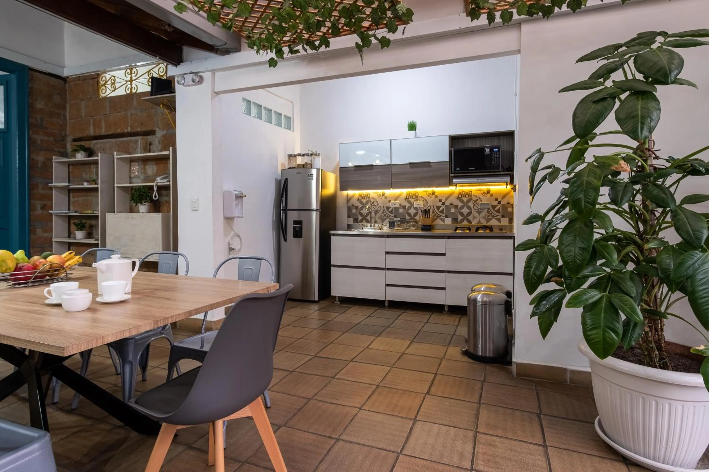 Kitchen or kitchenette in Botánica Casa Hotel