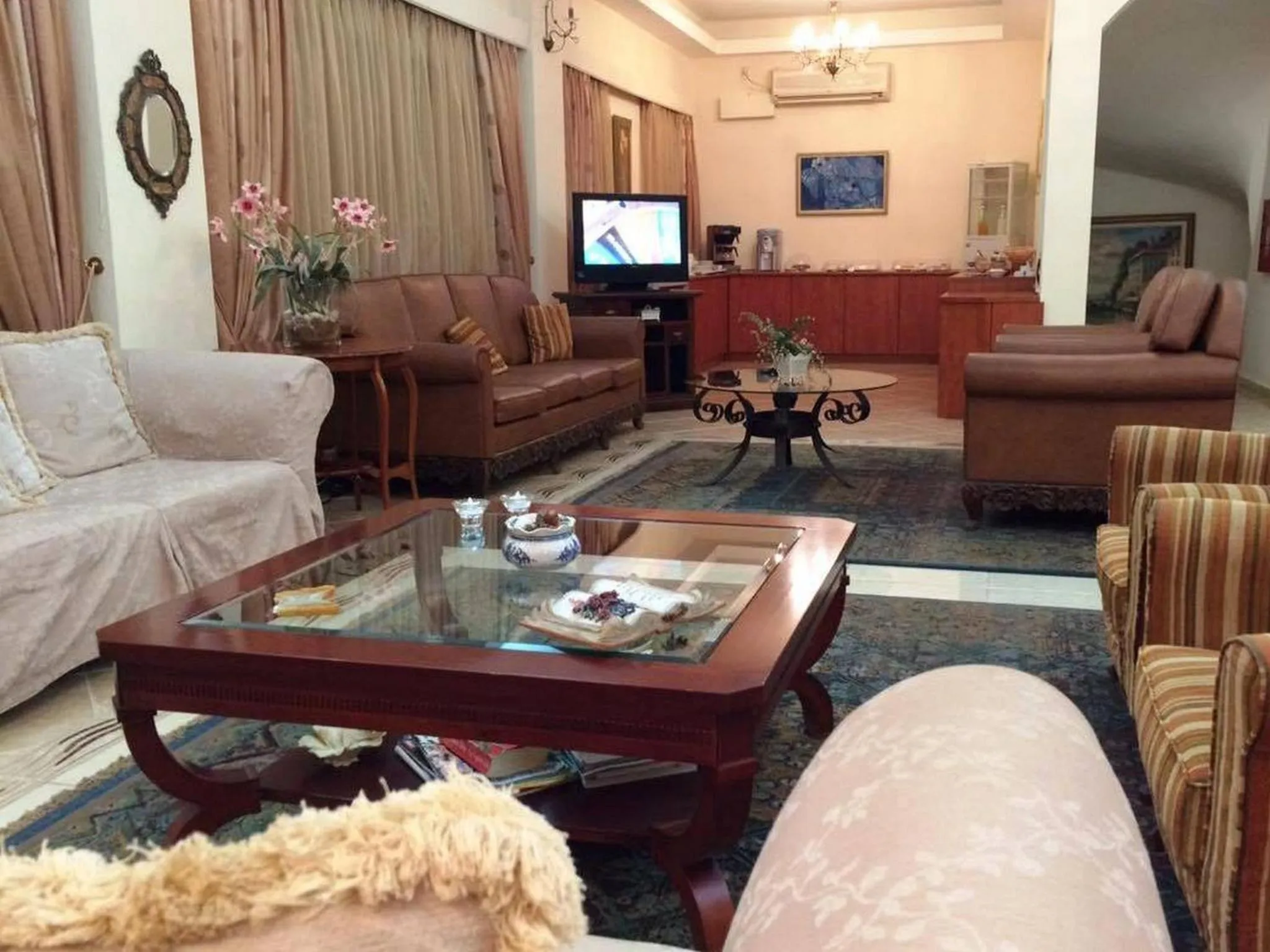 Communal lounge/ TV room in Nefeli Hotel