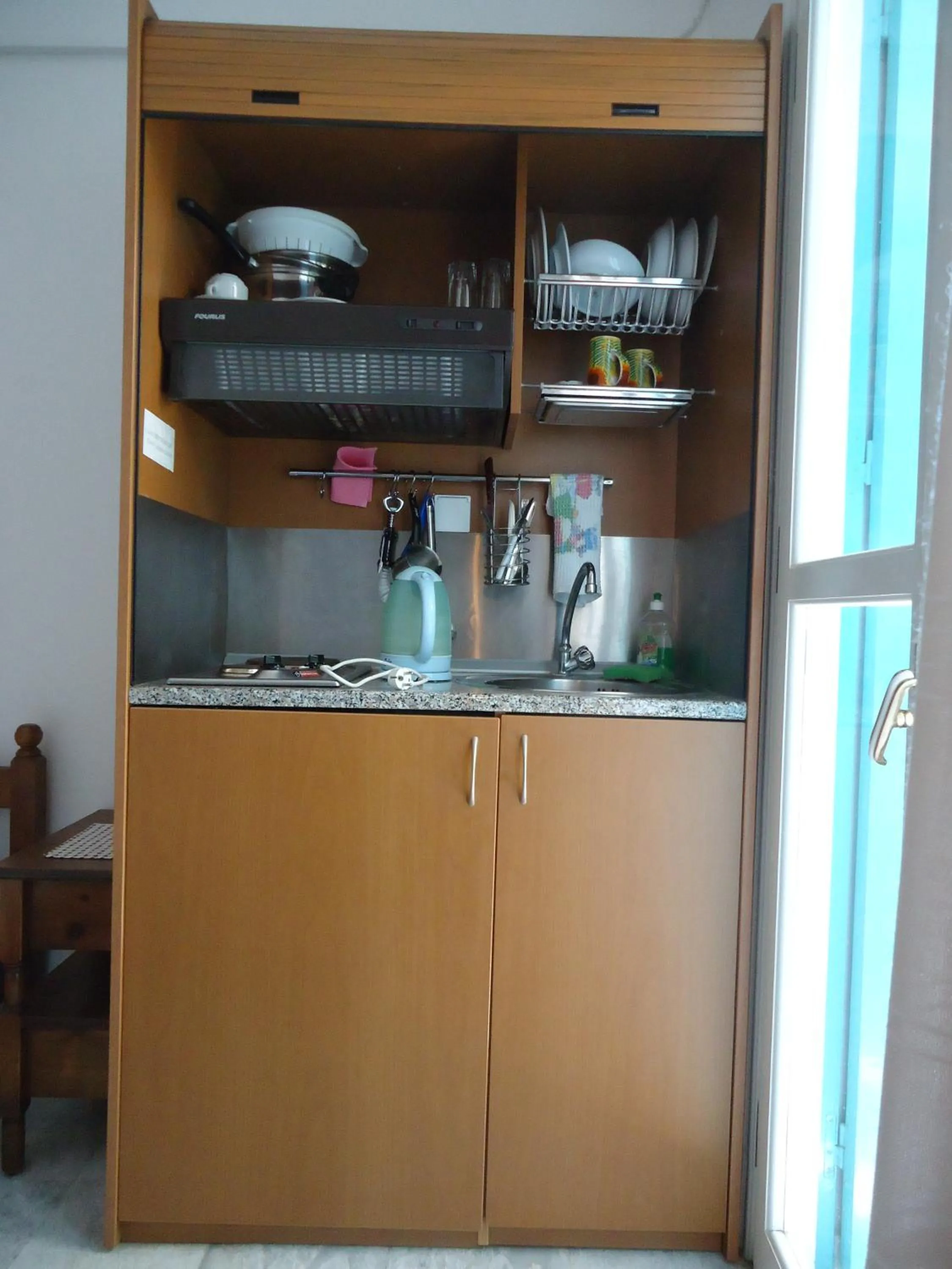 Kitchen or kitchenette in Zorbas Hotel