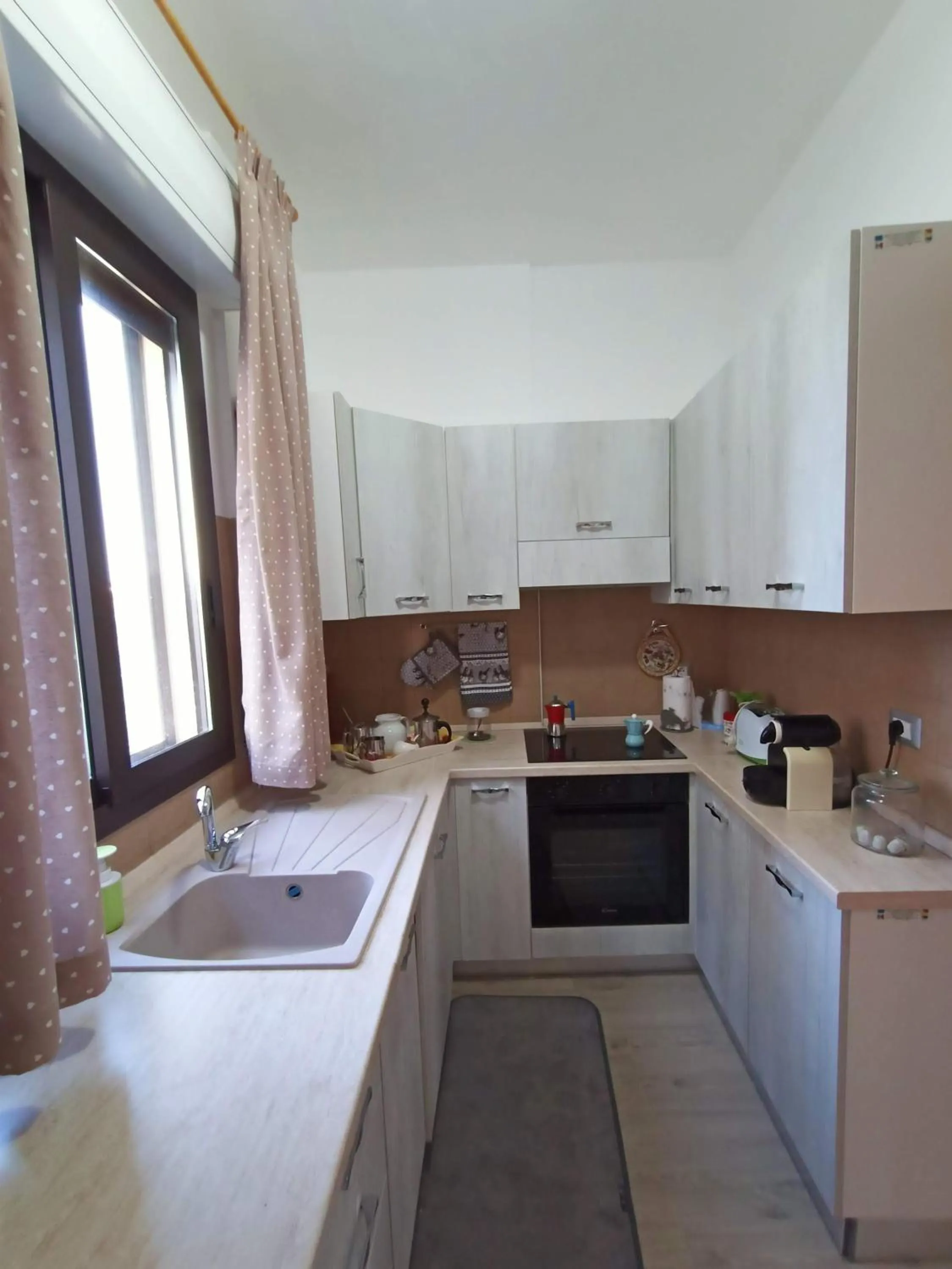 Kitchen or kitchenette in B&B Villa Sara Falconara