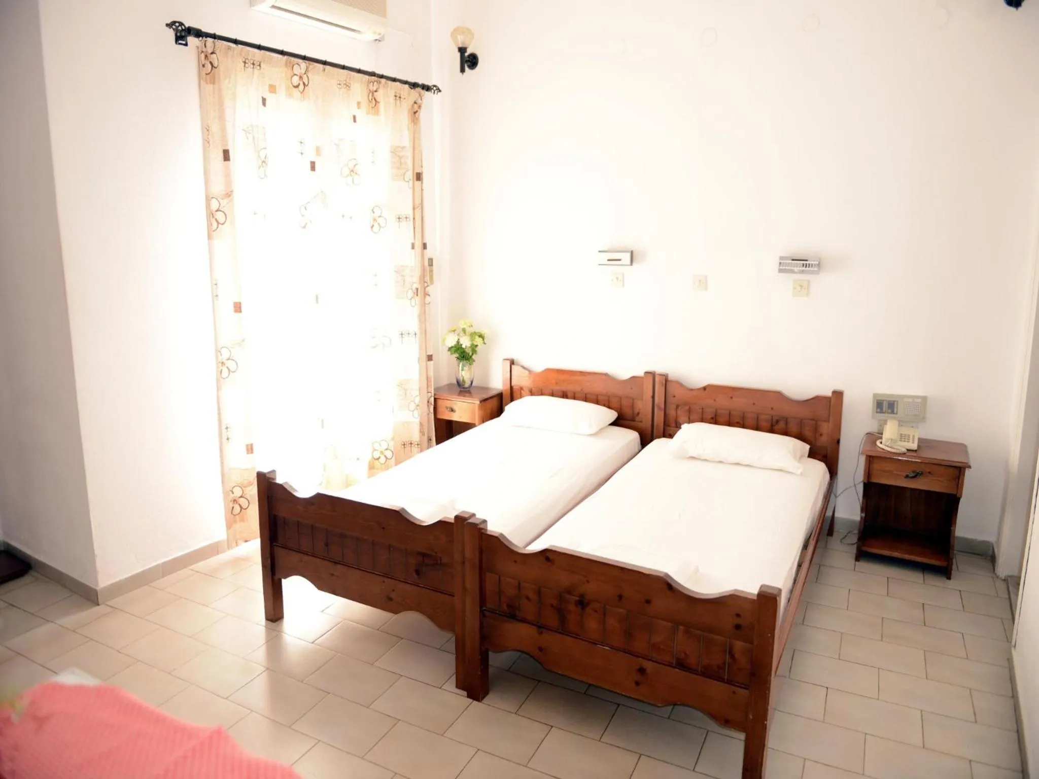 Bed in Anthemis Hotel