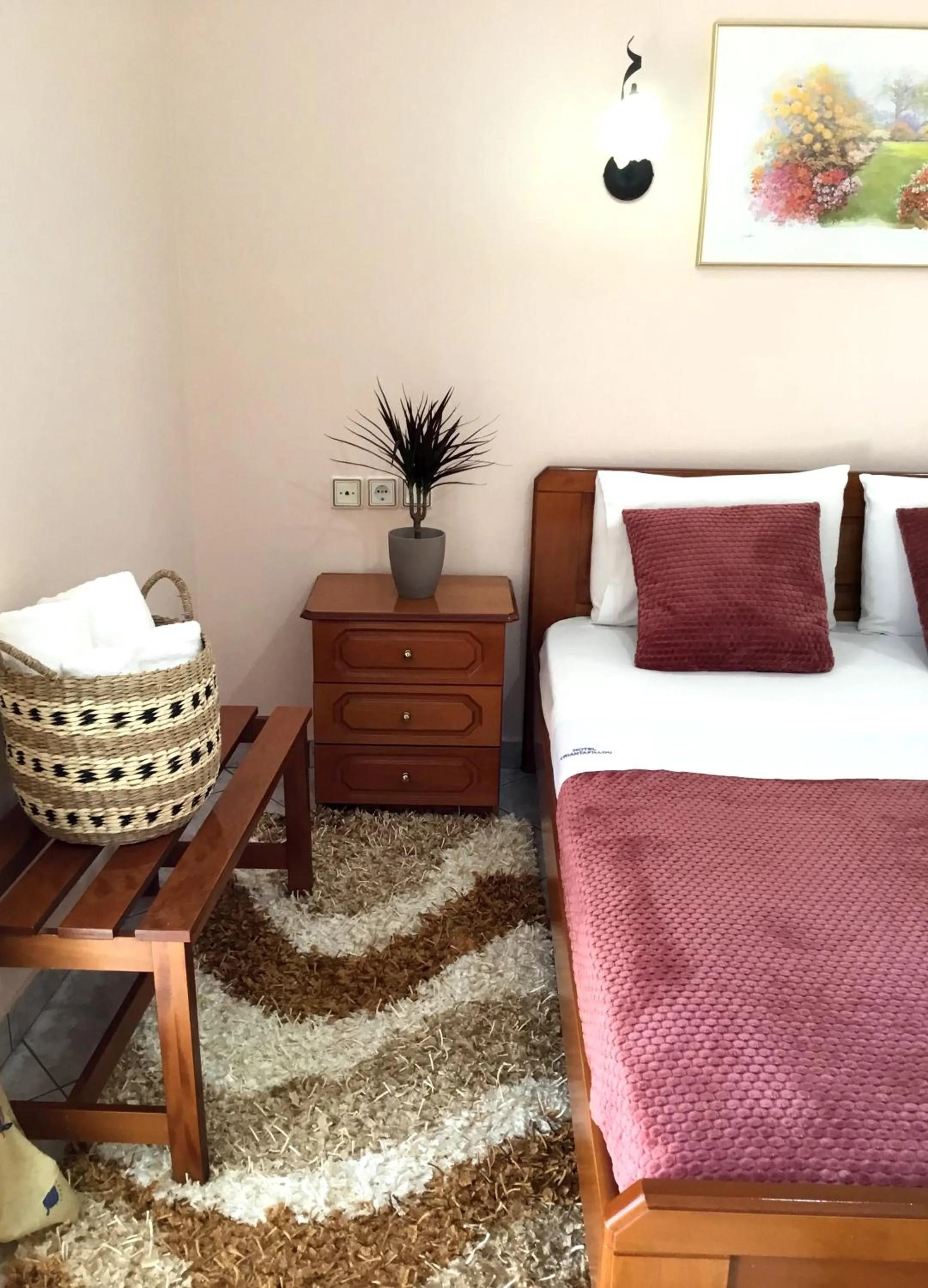 Bed in Hotel Triantafyllou