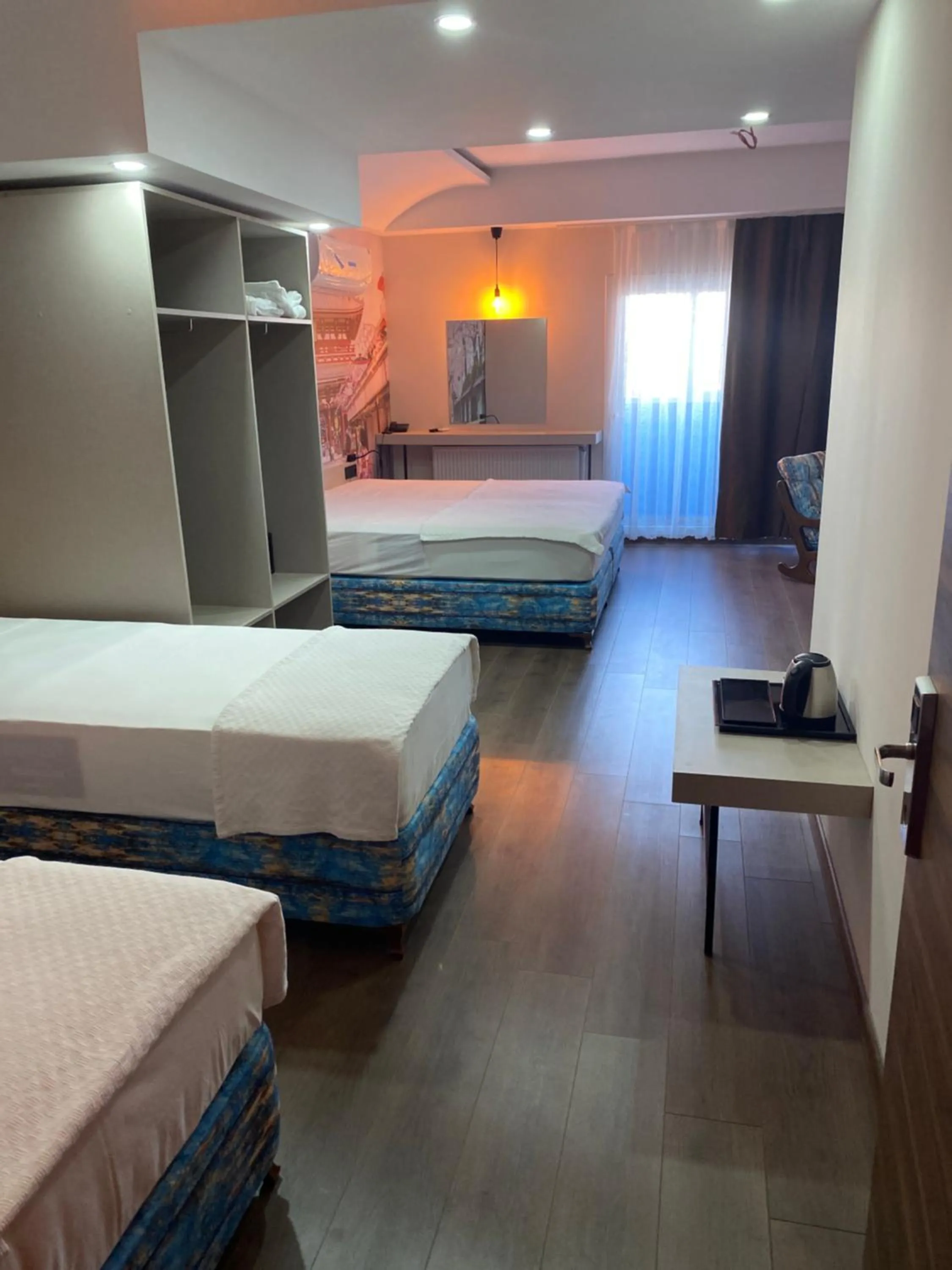 Bed in OFURO WORLD HOTEL SPA