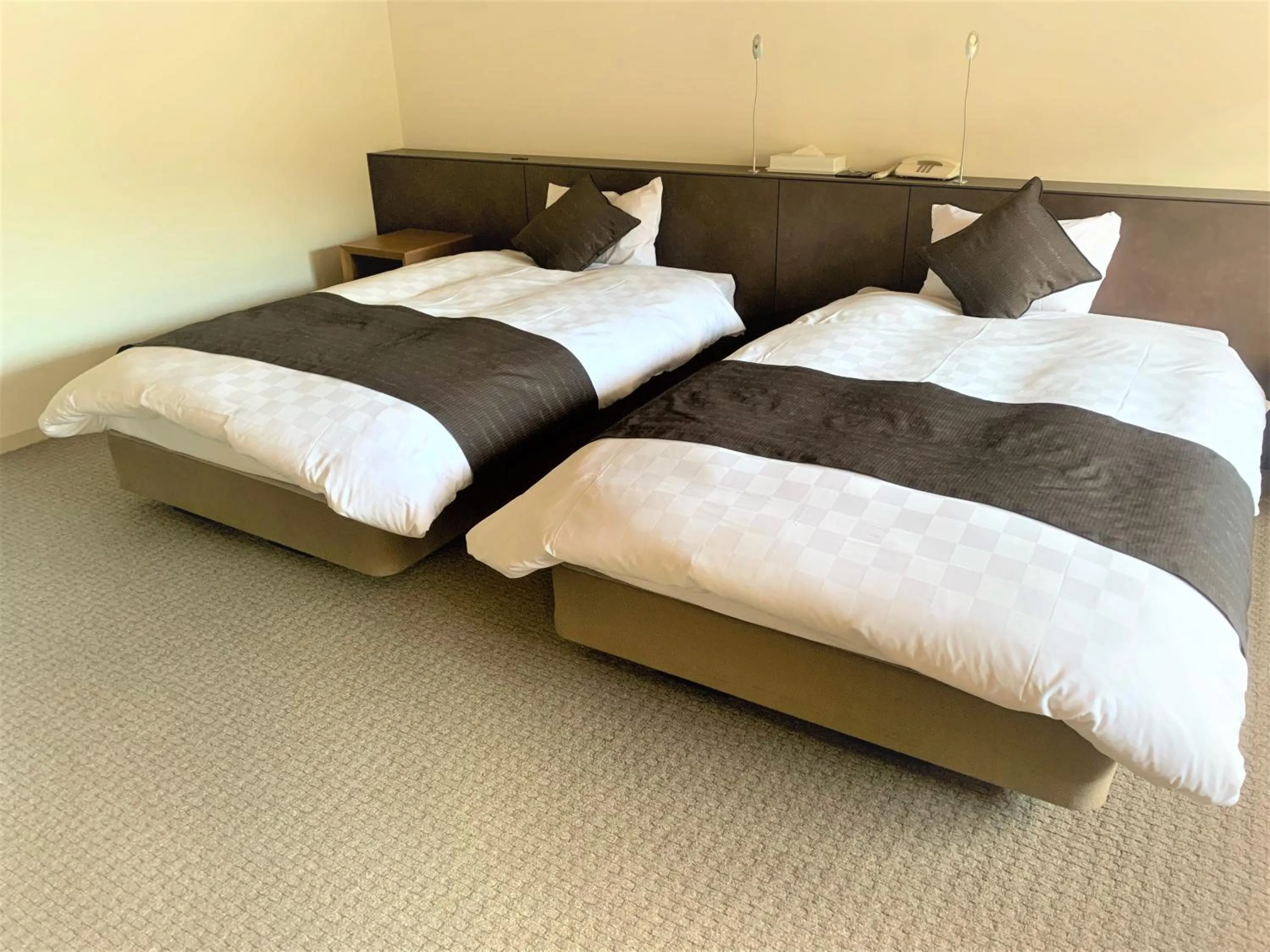 Bed in Hotel Mahoroba