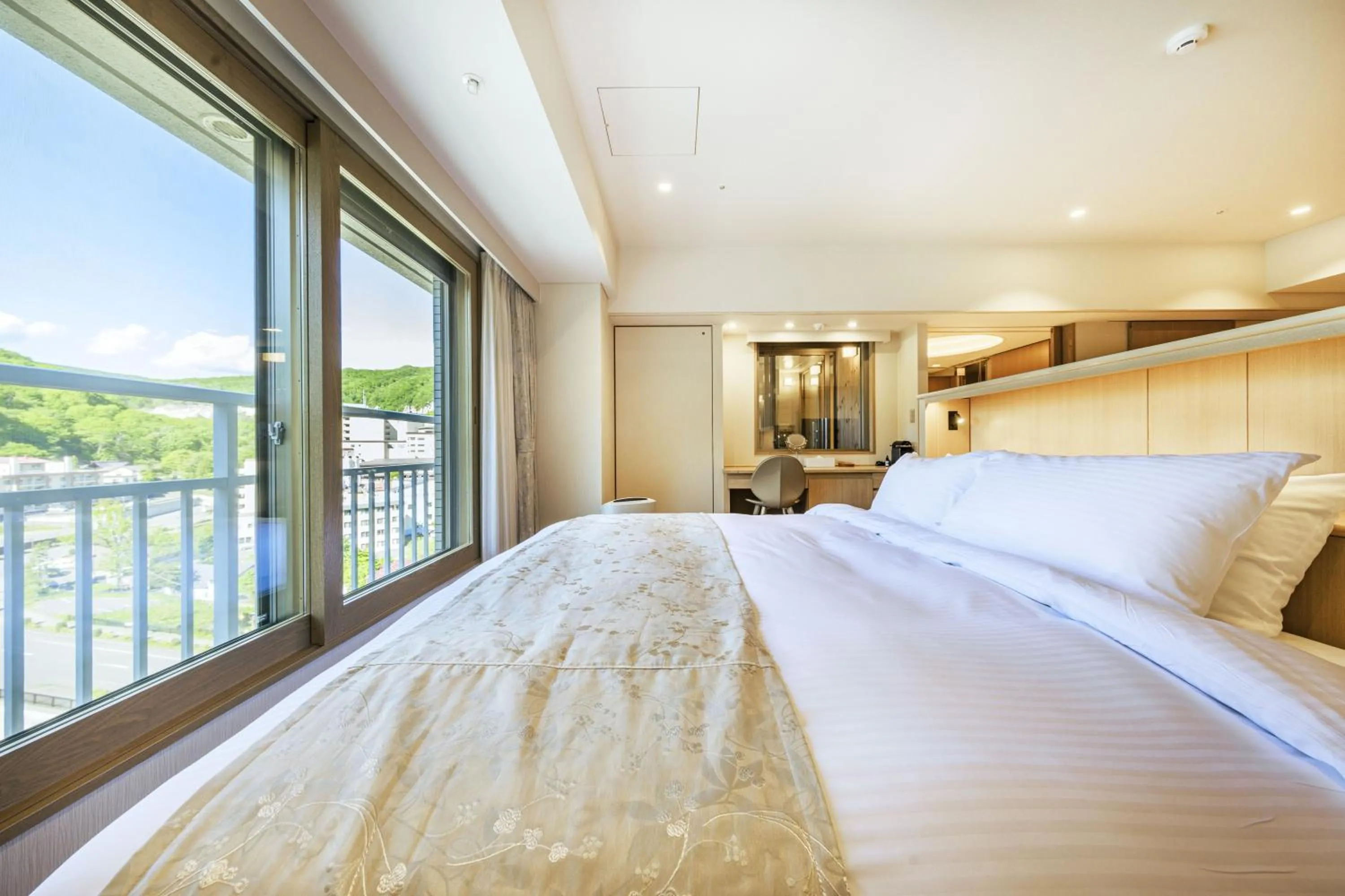 Bed in Hotel Mahoroba