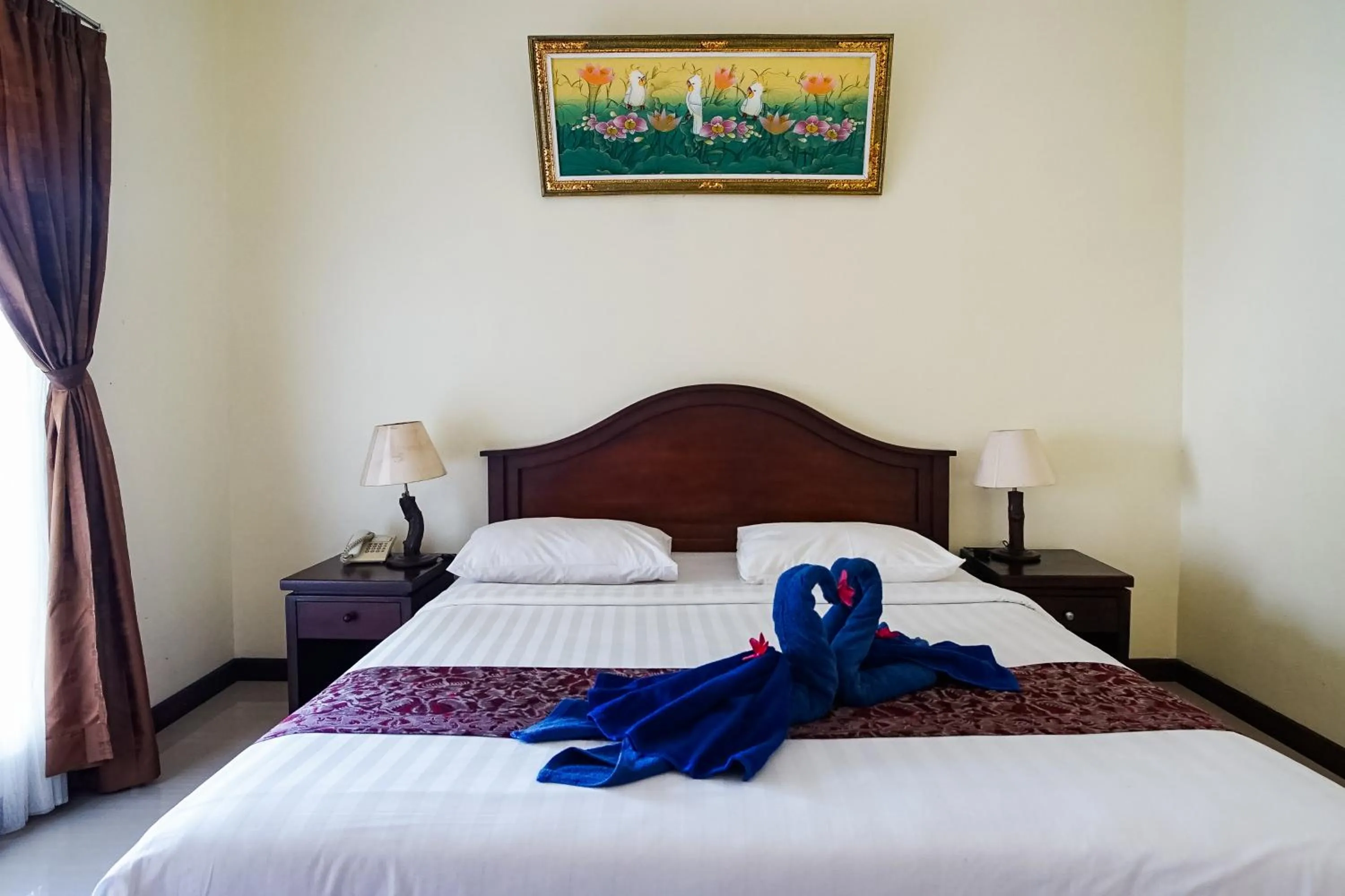 Bed in Taman Ayu Legian Hotel