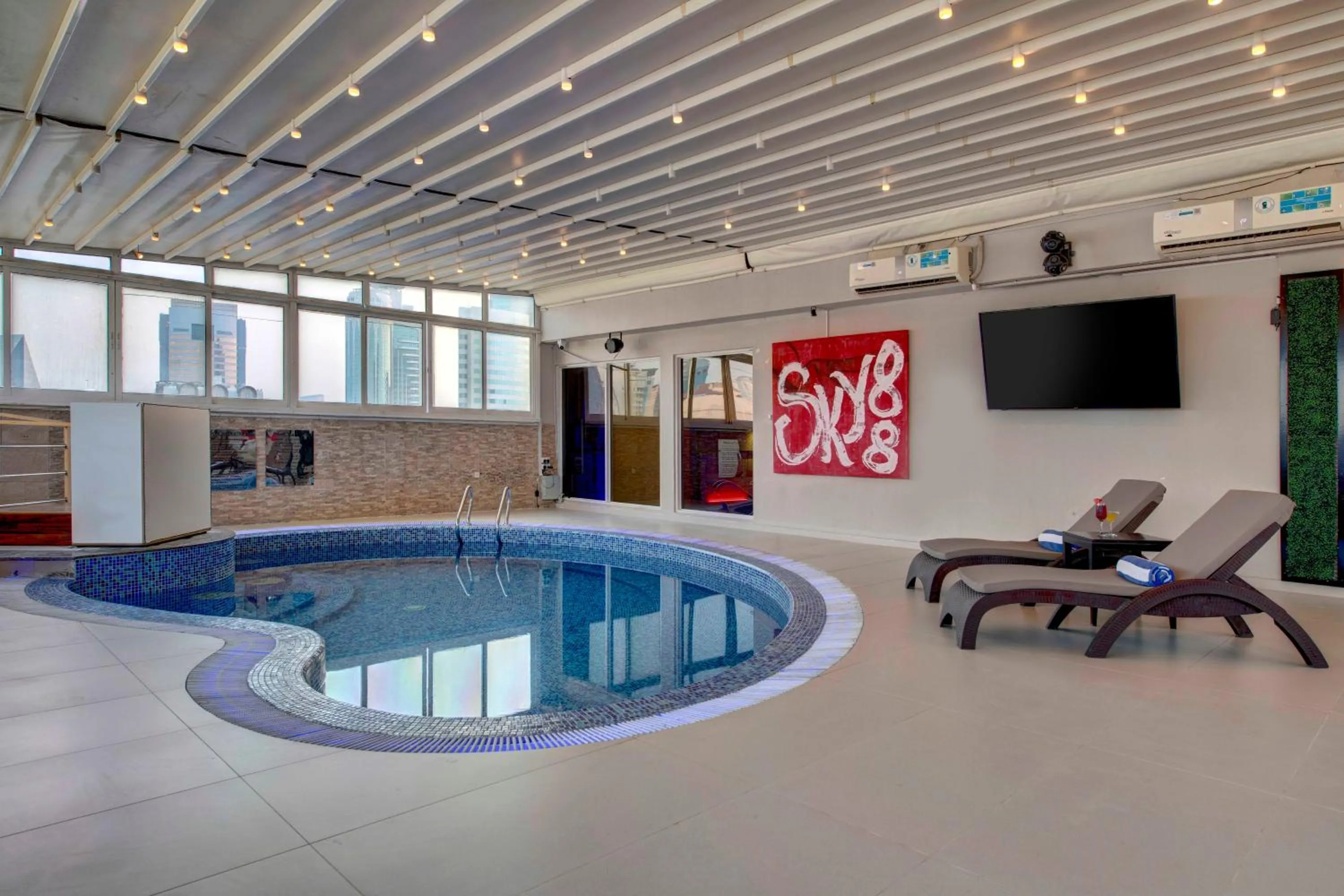 Communal lounge/ TV room in Lotus Grand Hotel