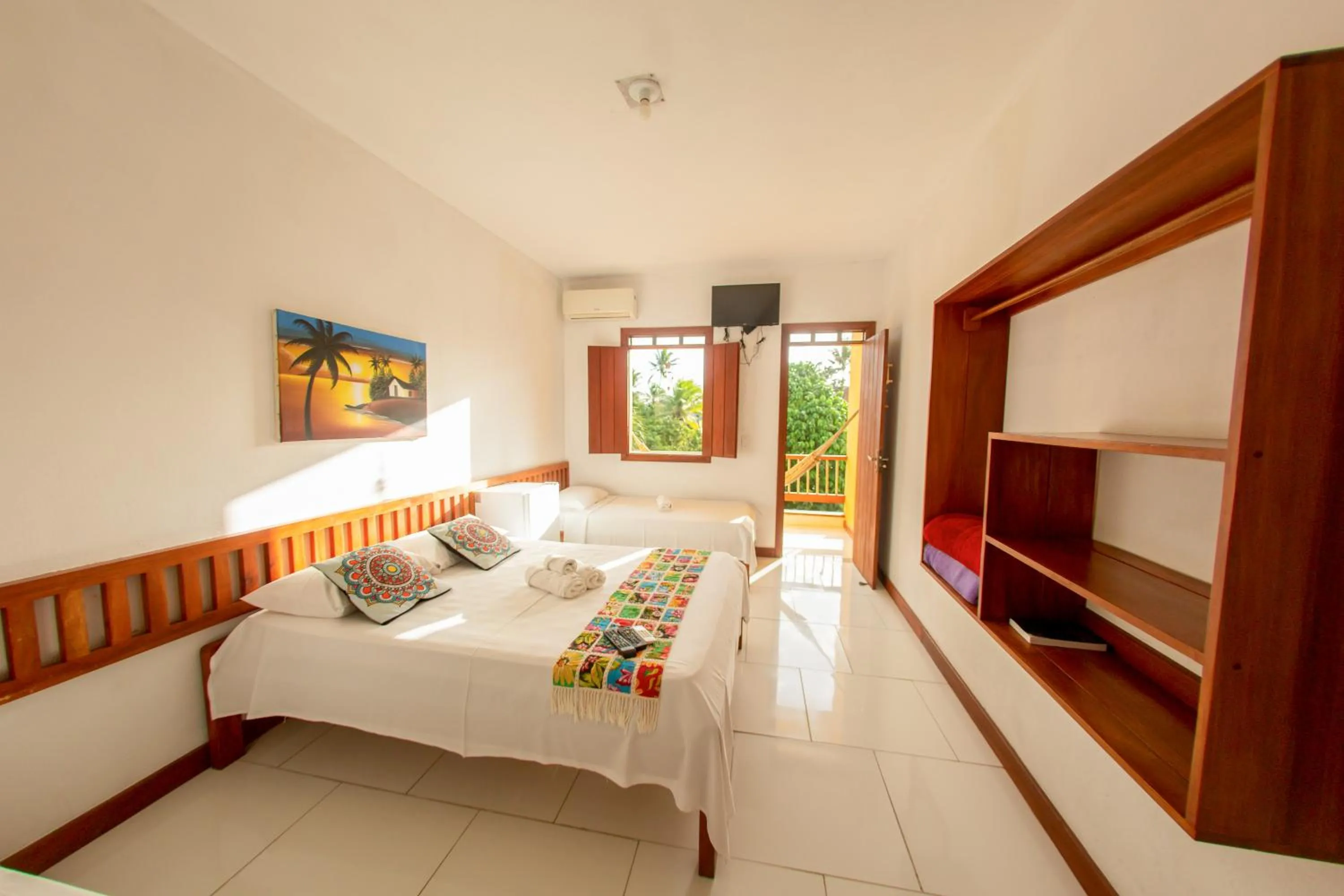 Bed in Pousada Flor do Arraial