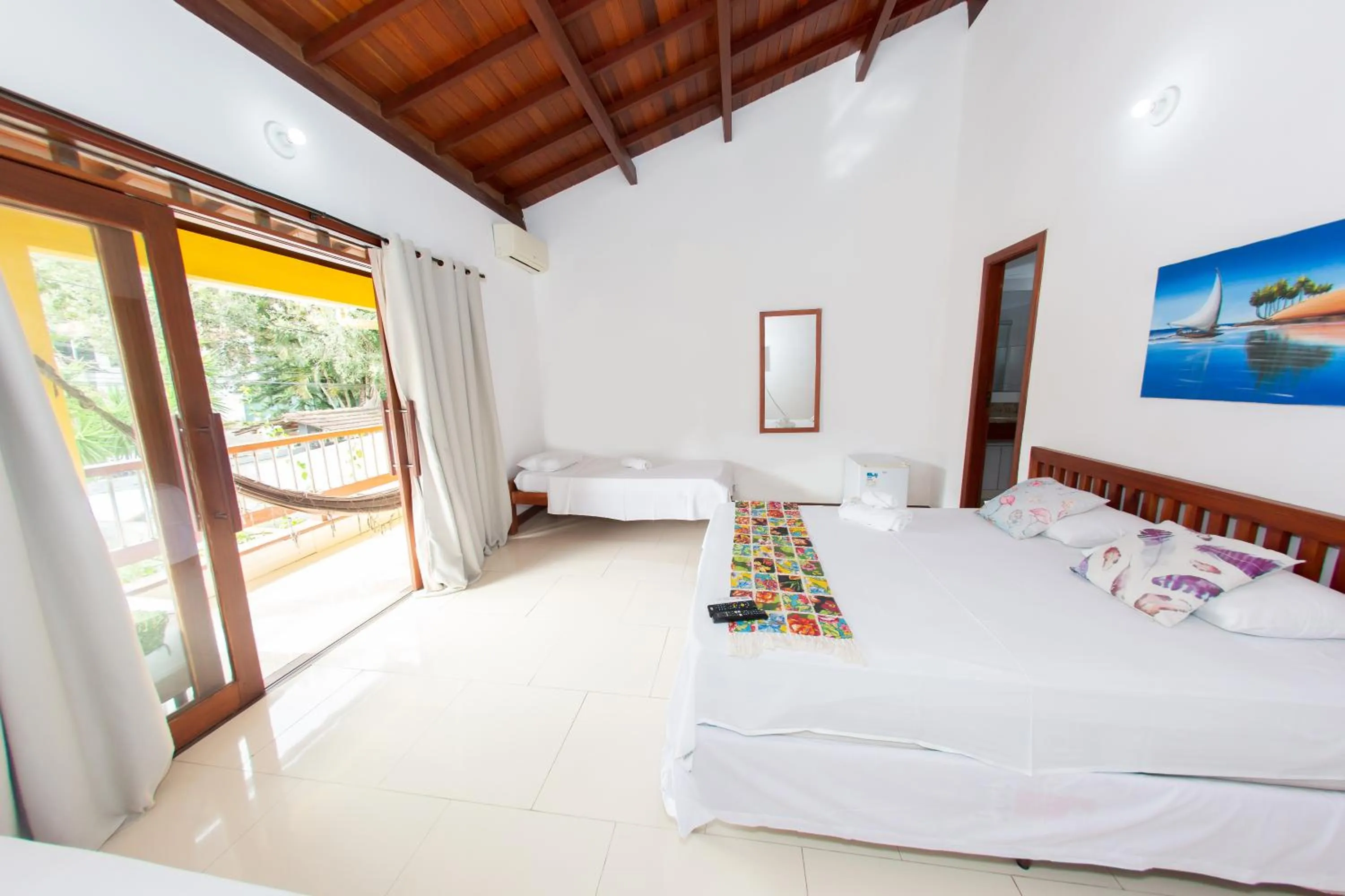 Bed in Pousada Flor do Arraial