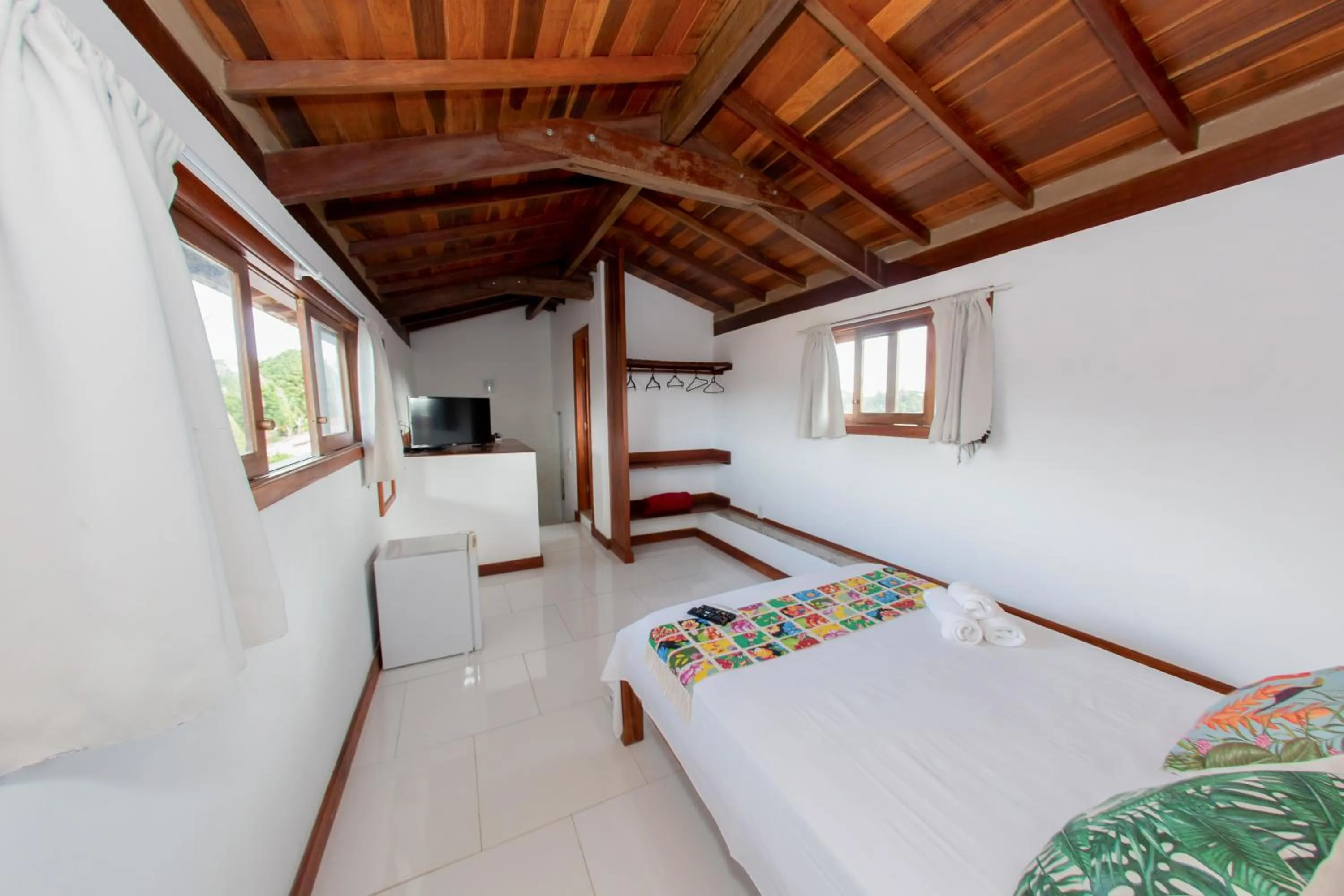 Bed in Pousada Flor do Arraial