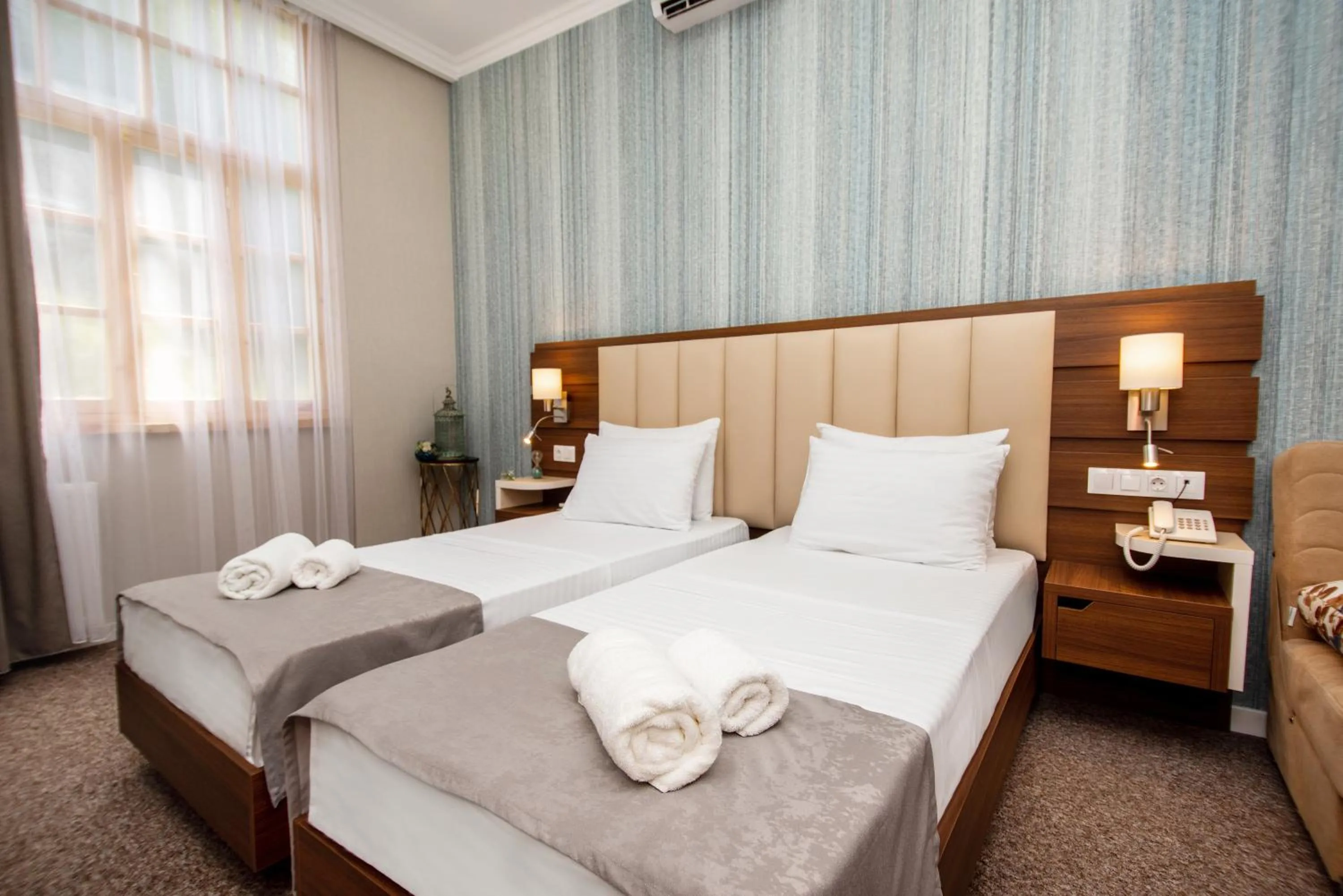 Bed in Margi Boutique Hotel by DNT Group