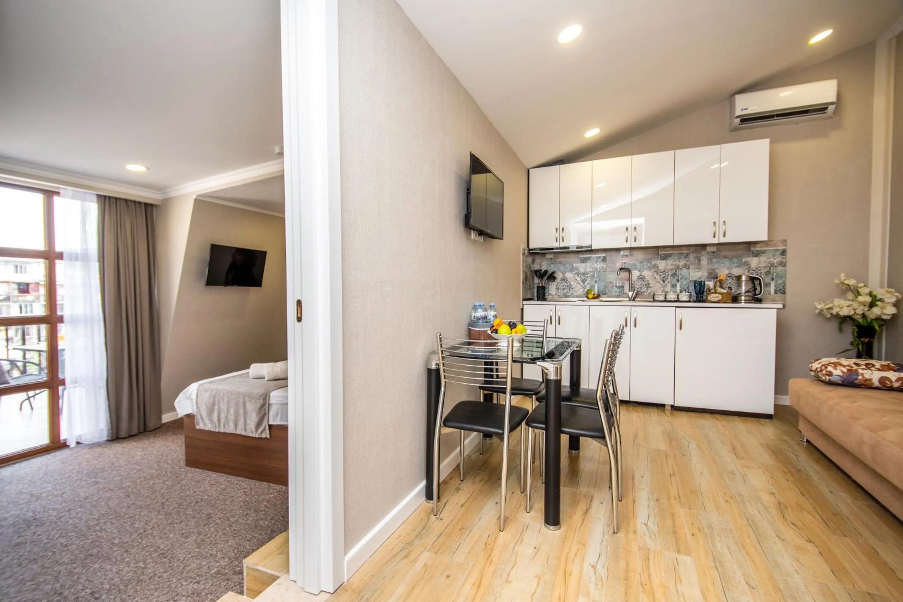 Kitchen or kitchenette, Bed in Margi Boutique Hotel by DNT Group