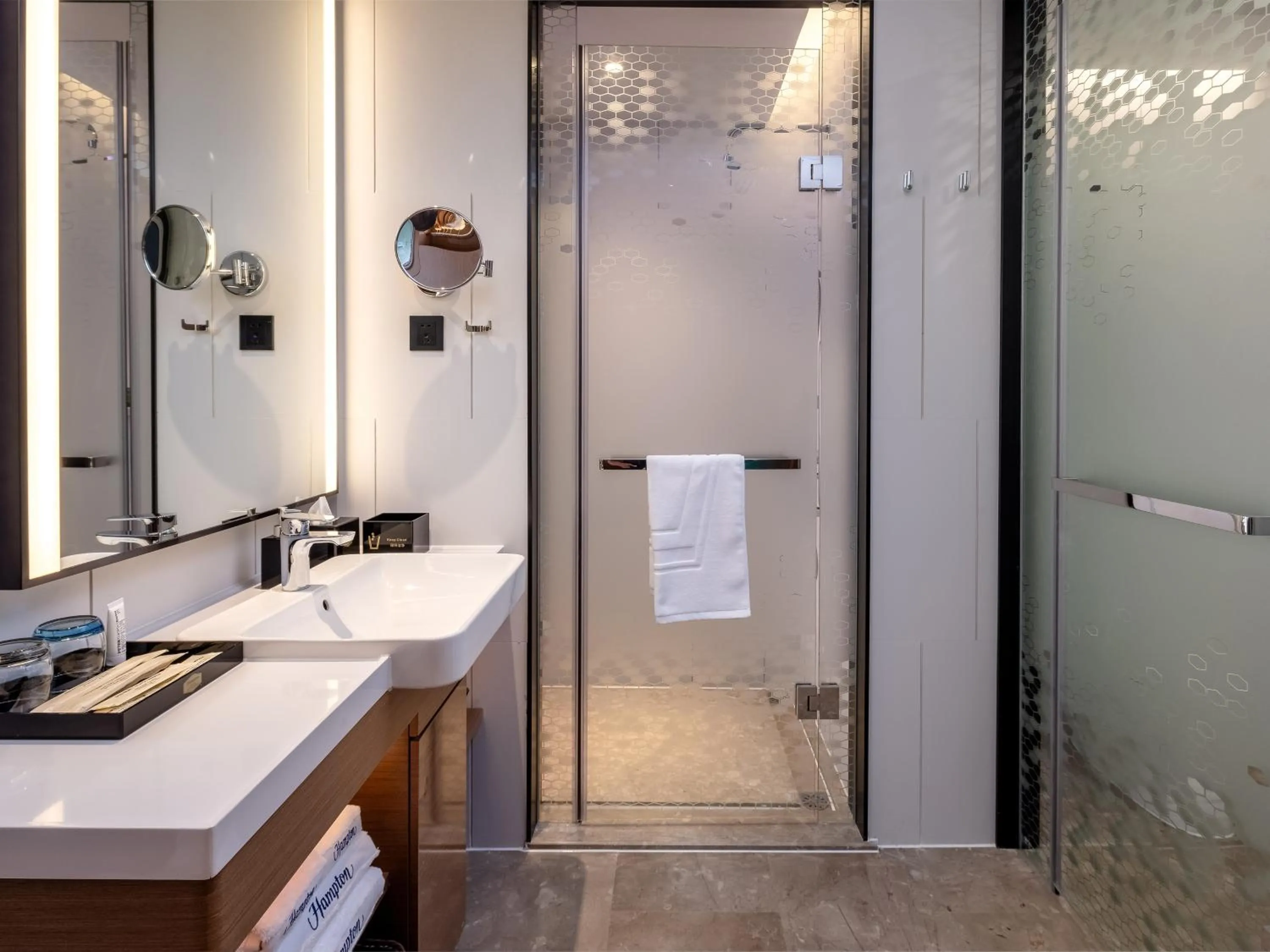 Toilet in Hampton by Hilton Nanning Wuxiang