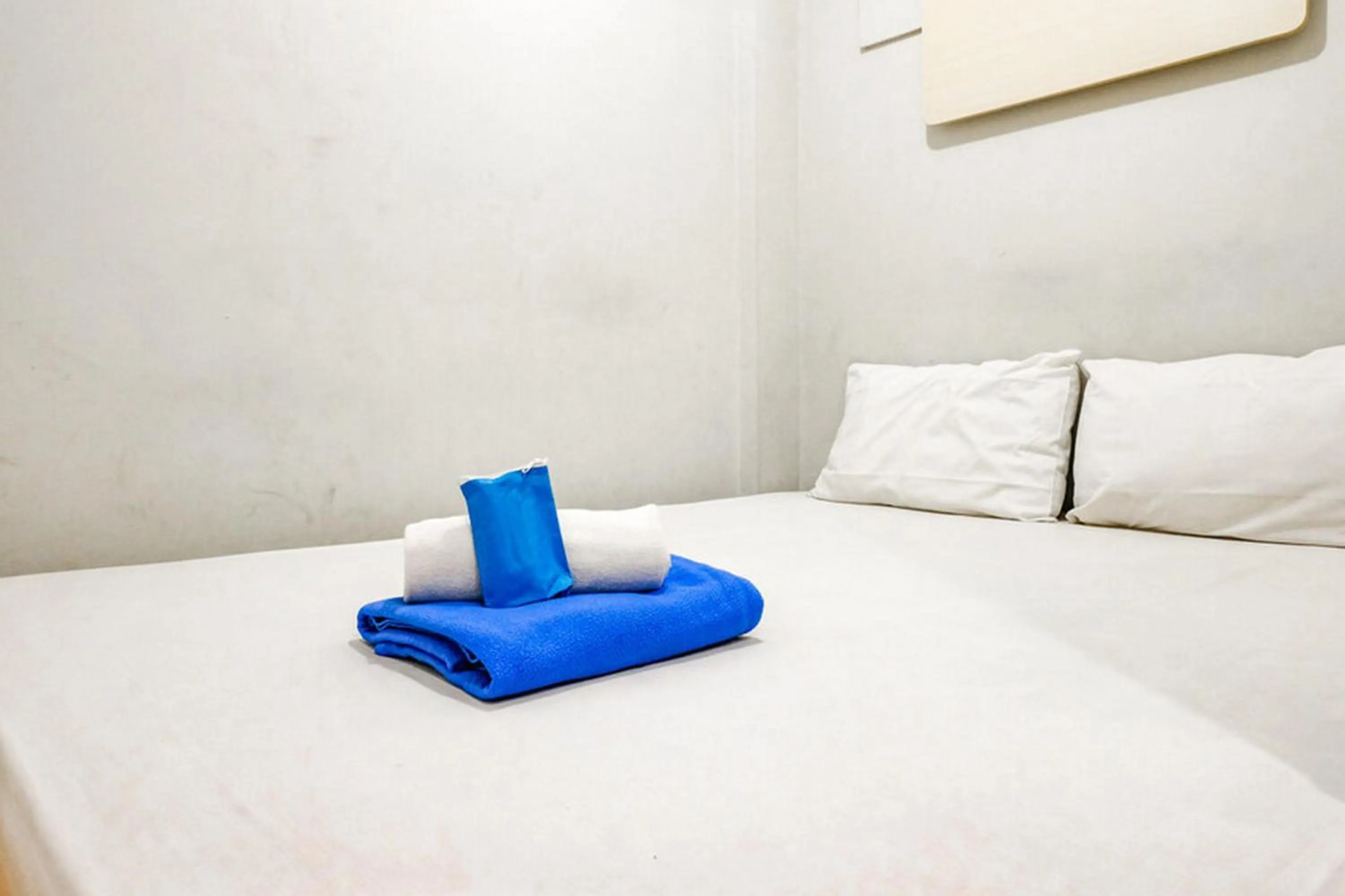 Bed in Marson Interkota Residence Mitra RedDoorz