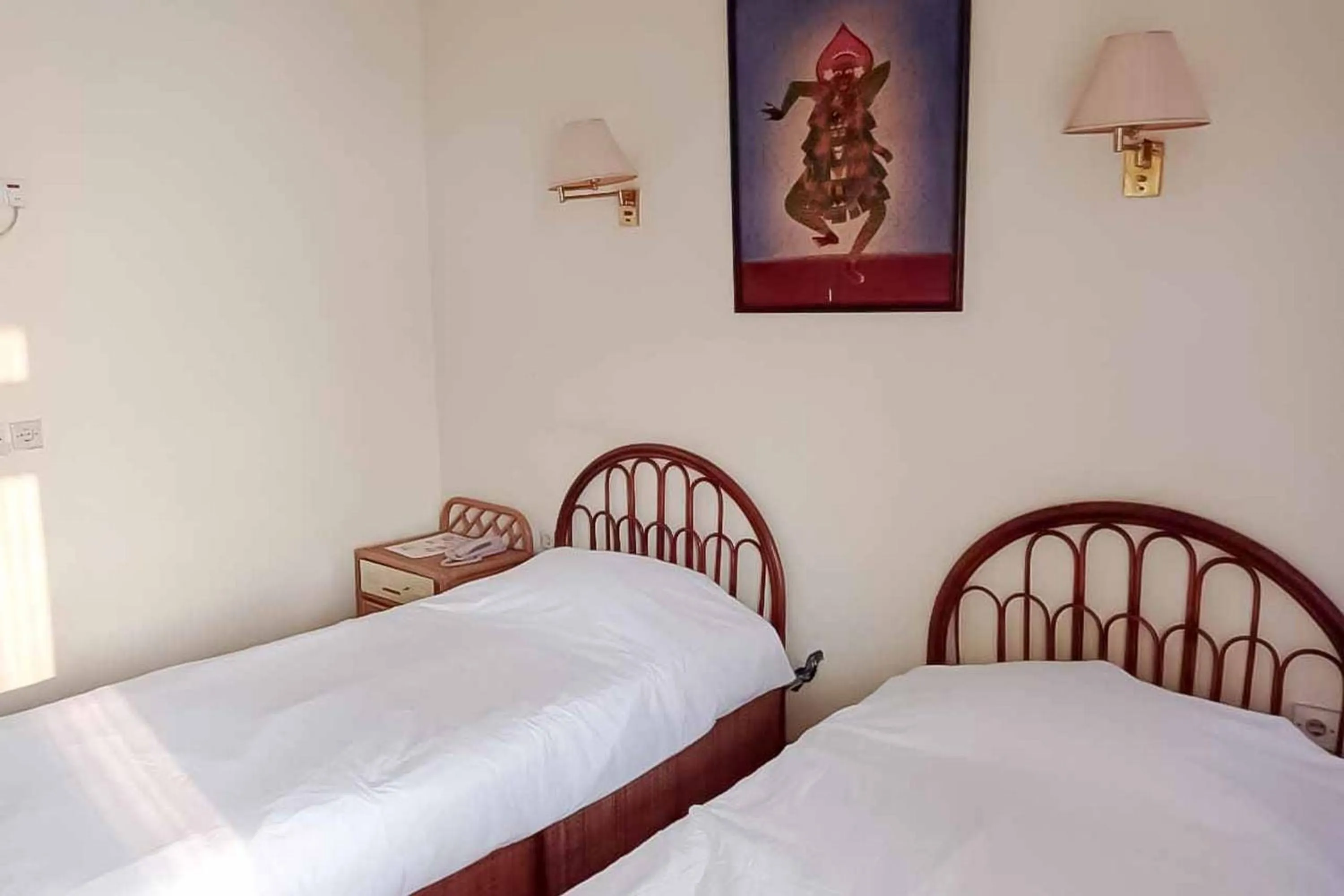 Bed in RedDoorz Plus near Tugu Mercusuar Anyer