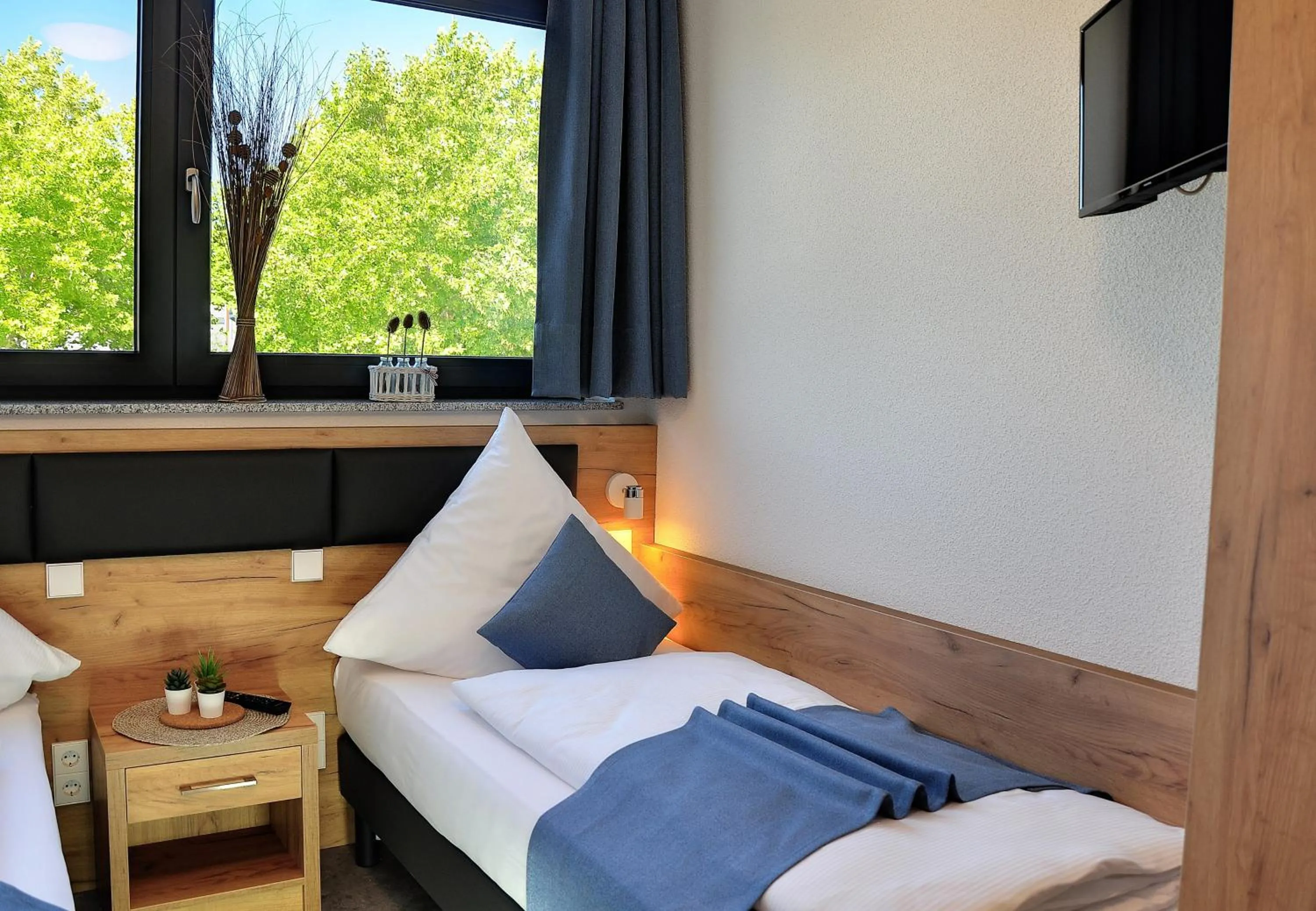 Bed in Motel am Fürfelder Schloss