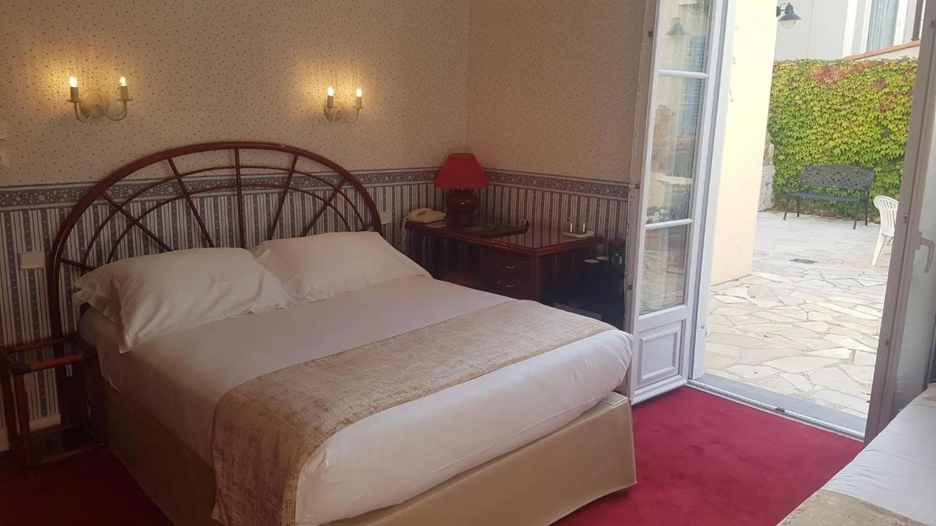 Bed in Hôtel de Charme Brise Marine