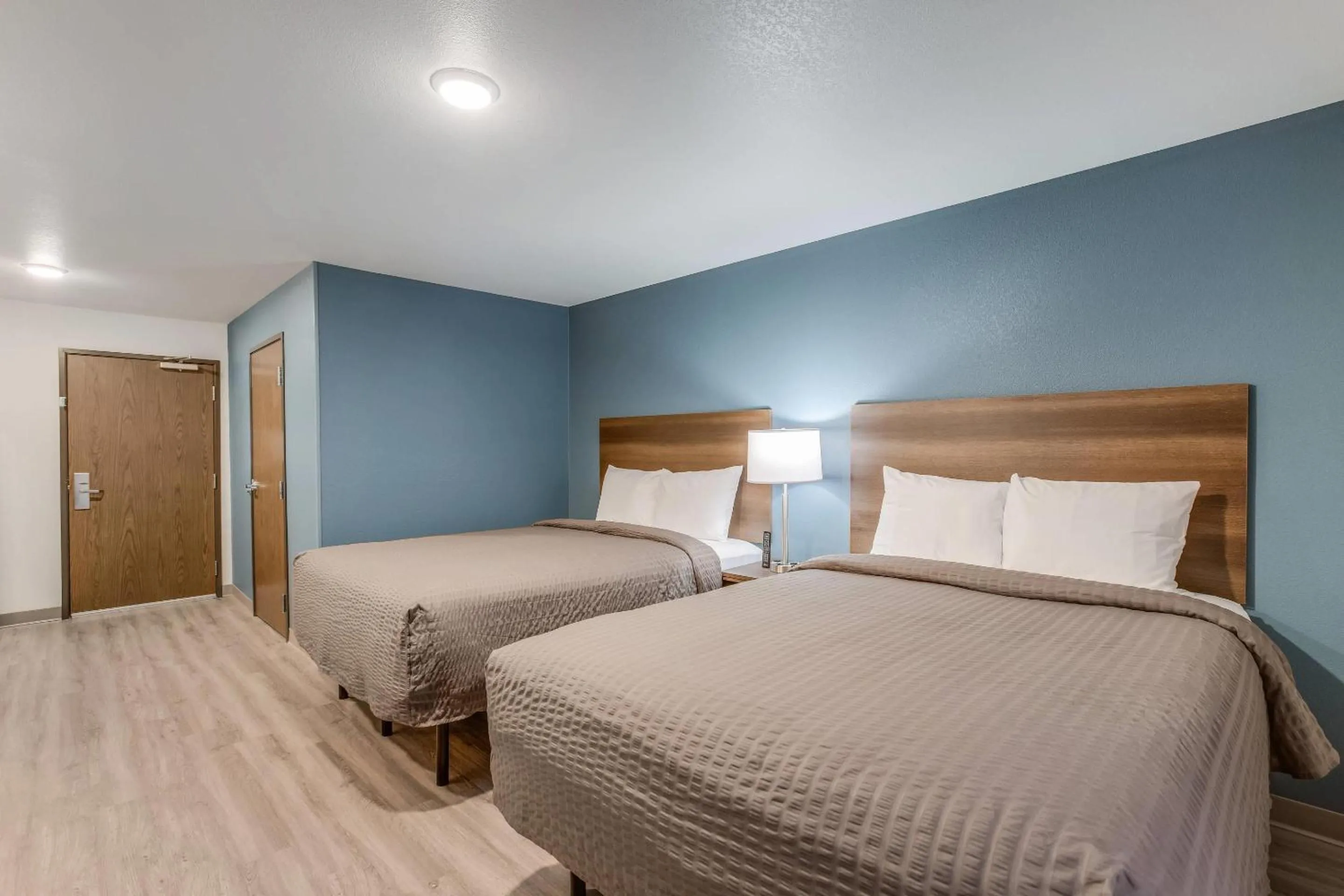 Bedroom, Bed in WoodSpring Suites Novi Farmington