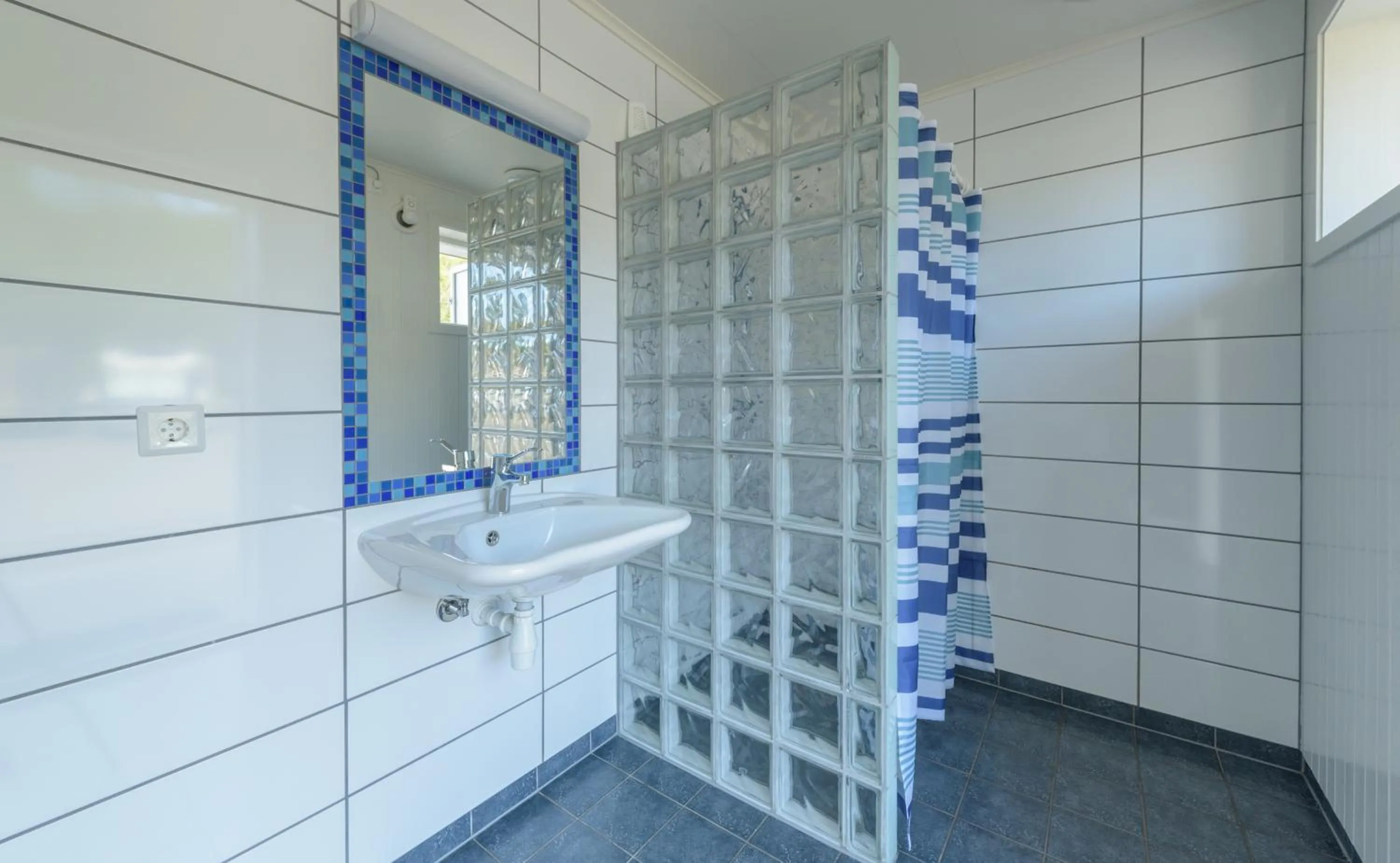 Shower in Kabelvåg Feriehus & Camping