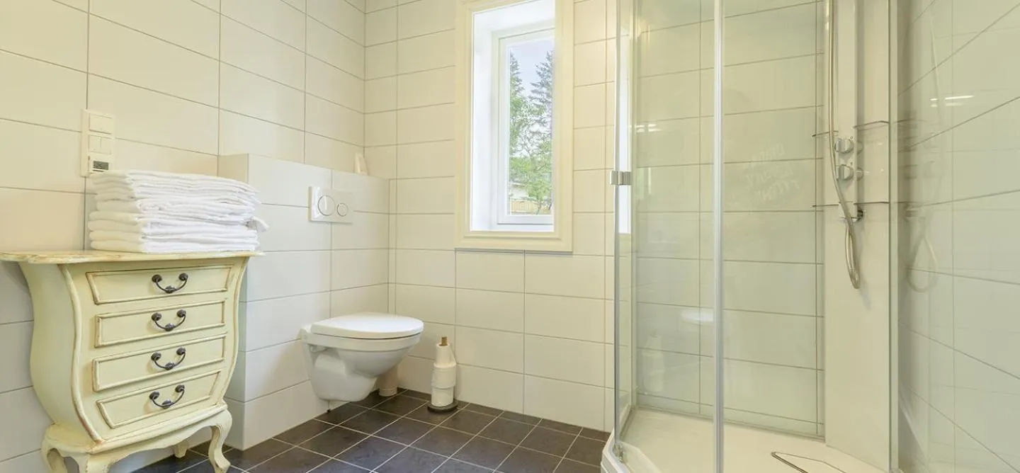 Shower in Kabelvåg Feriehus & Camping