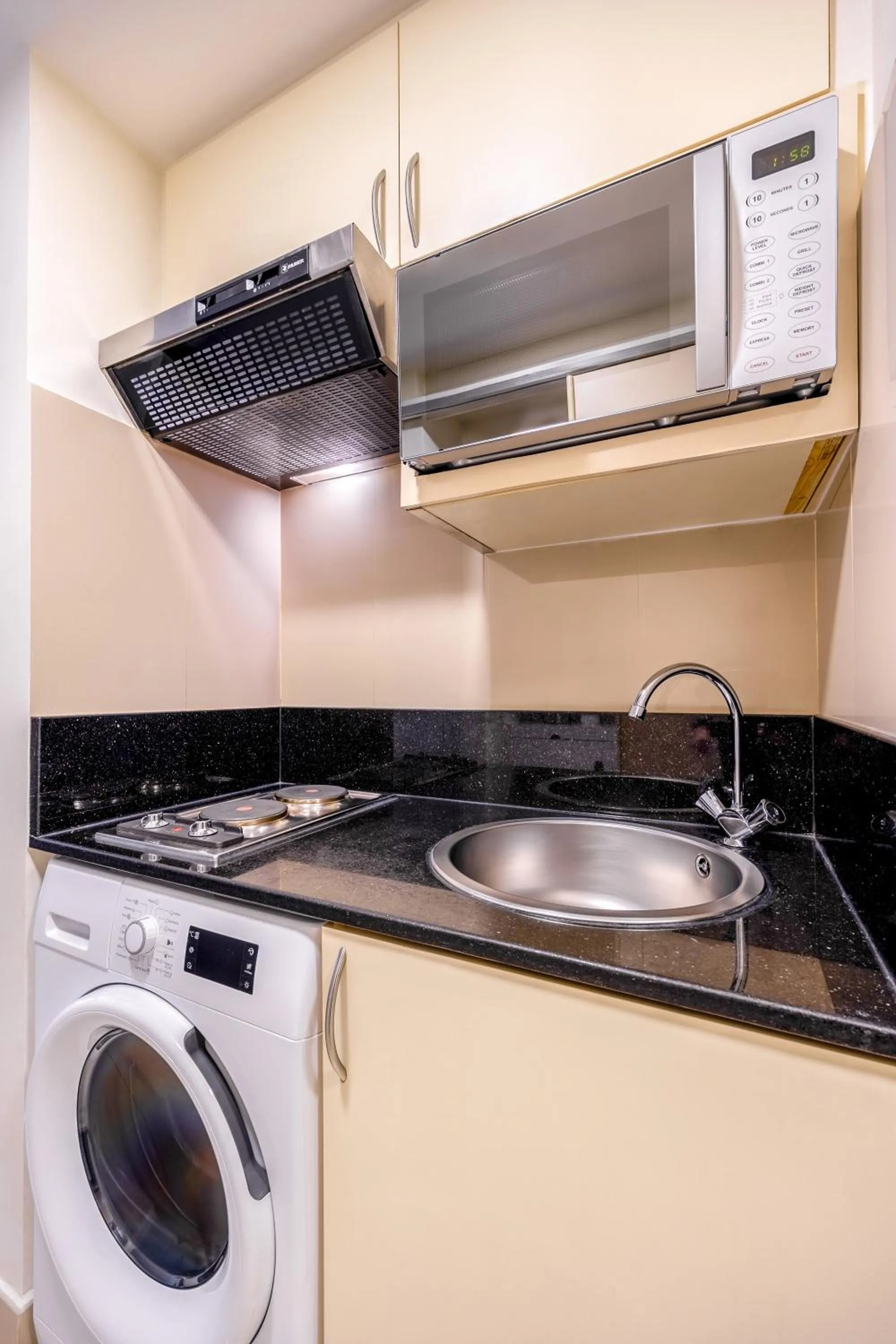 Kitchen or kitchenette in Golden Sands Hotel Apartments