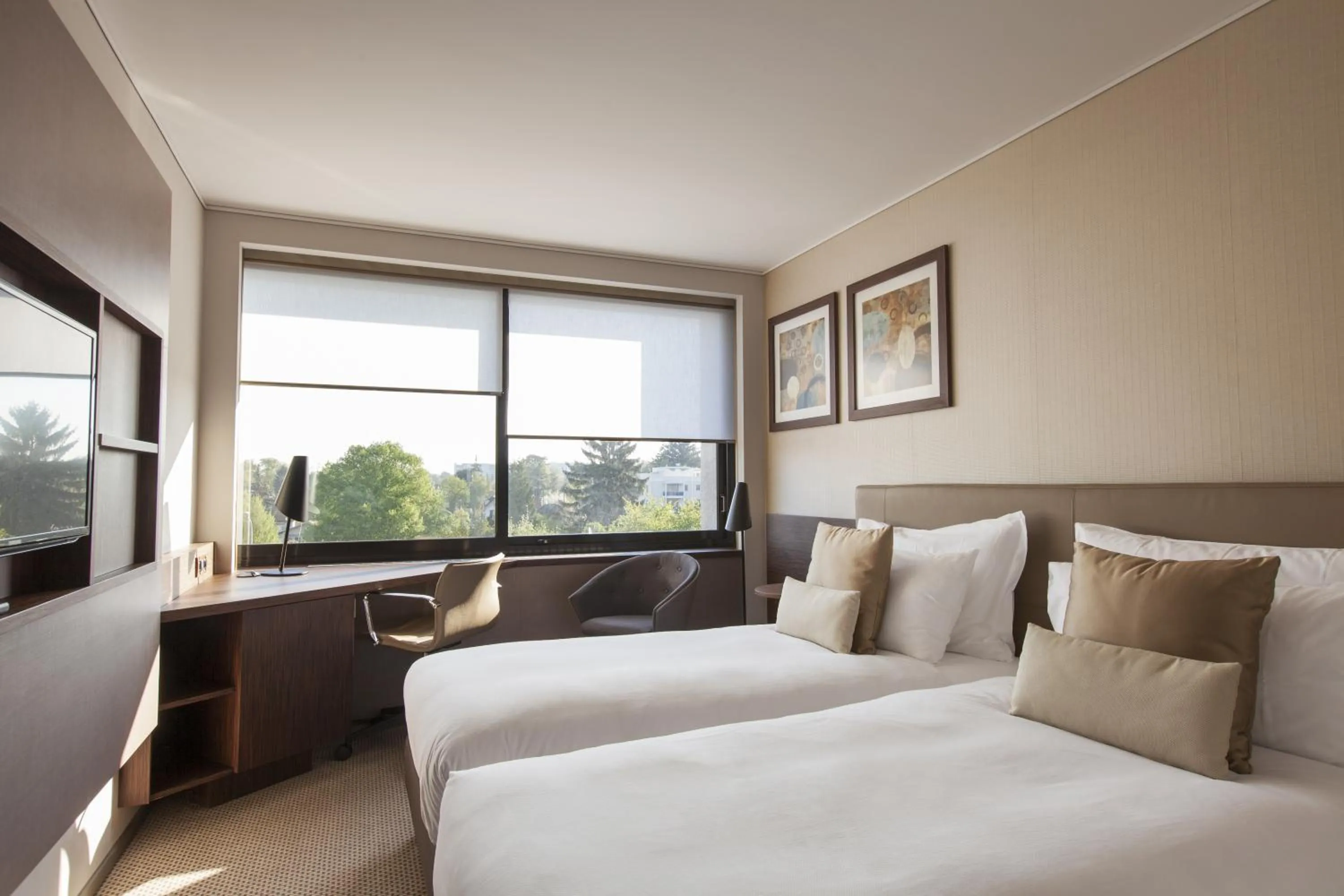 Photo of the whole room, Bed in Crowne Plaza Geneva by IHG
