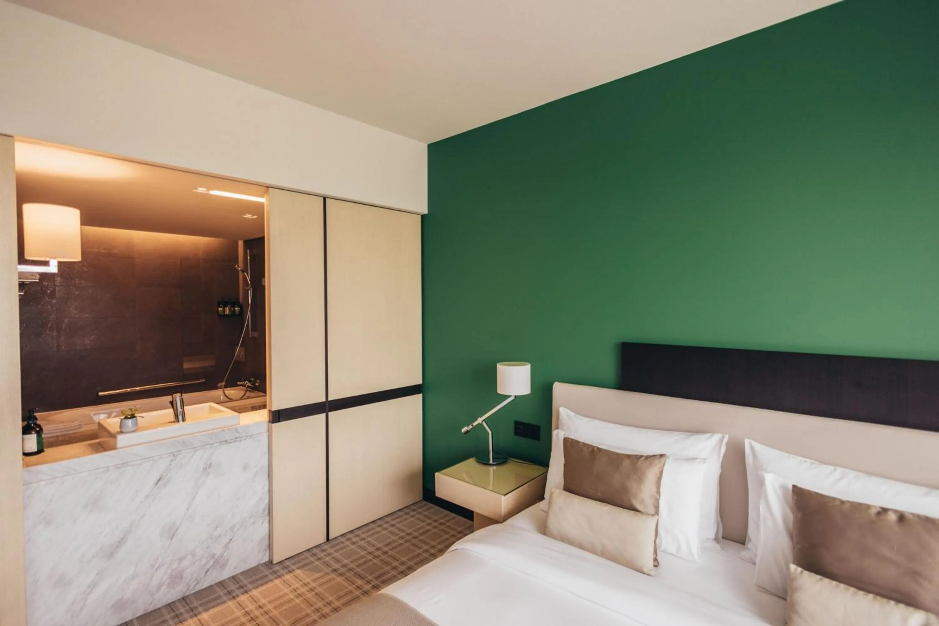 Photo of the whole room, Bed in Crowne Plaza Geneva by IHG