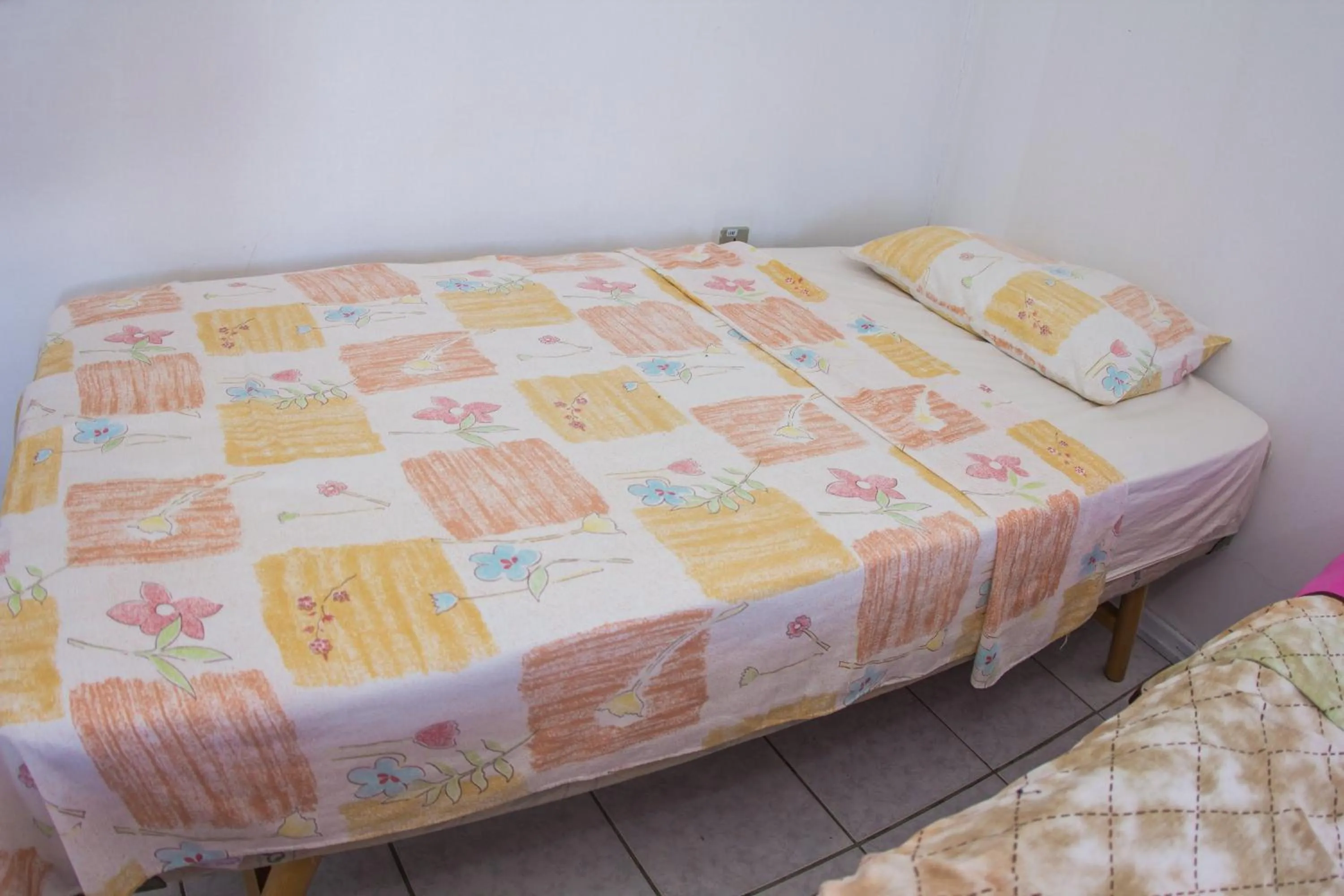 Bed in Hotel Recanto do Mar