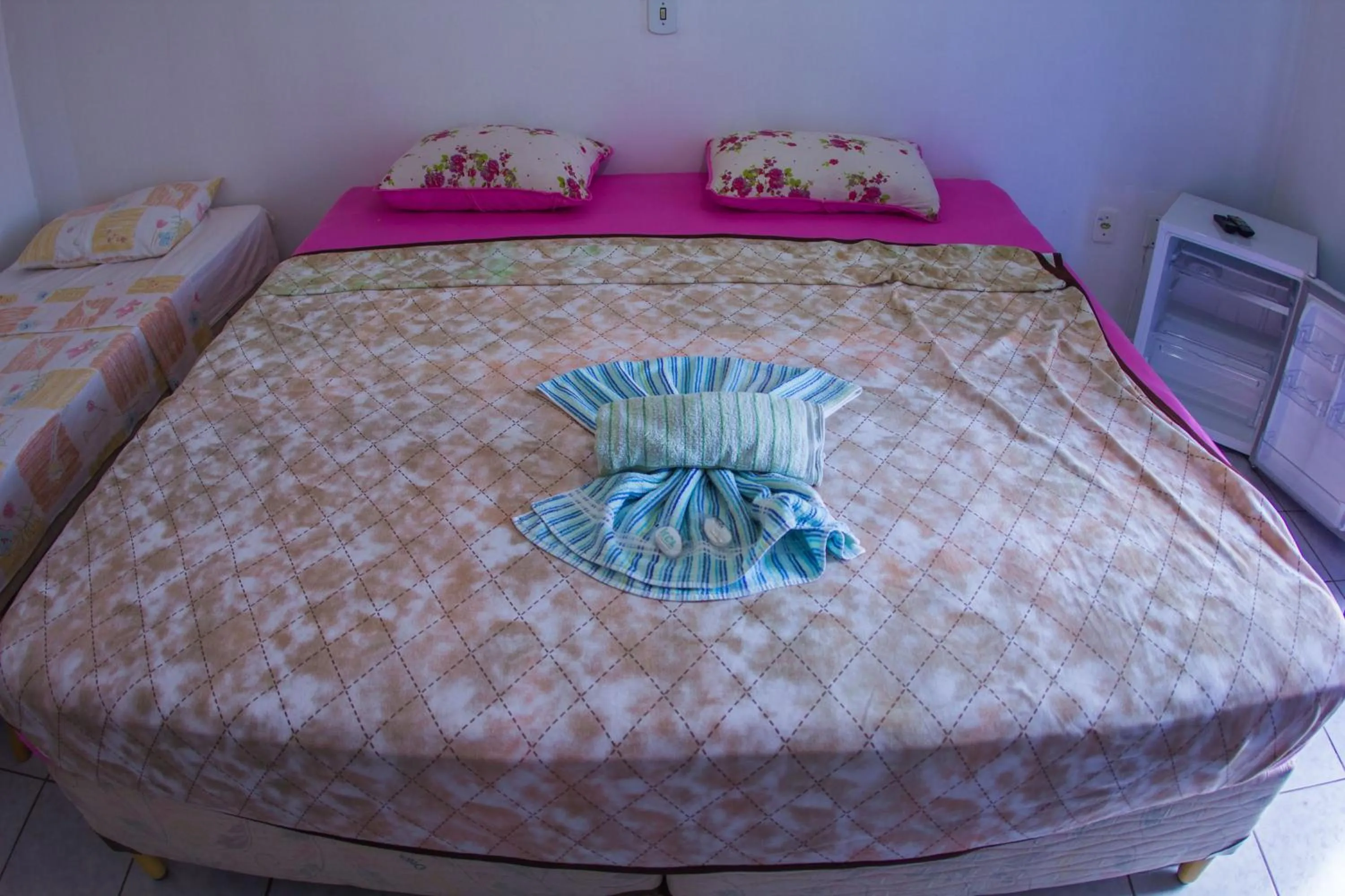 Bed in Hotel Recanto do Mar