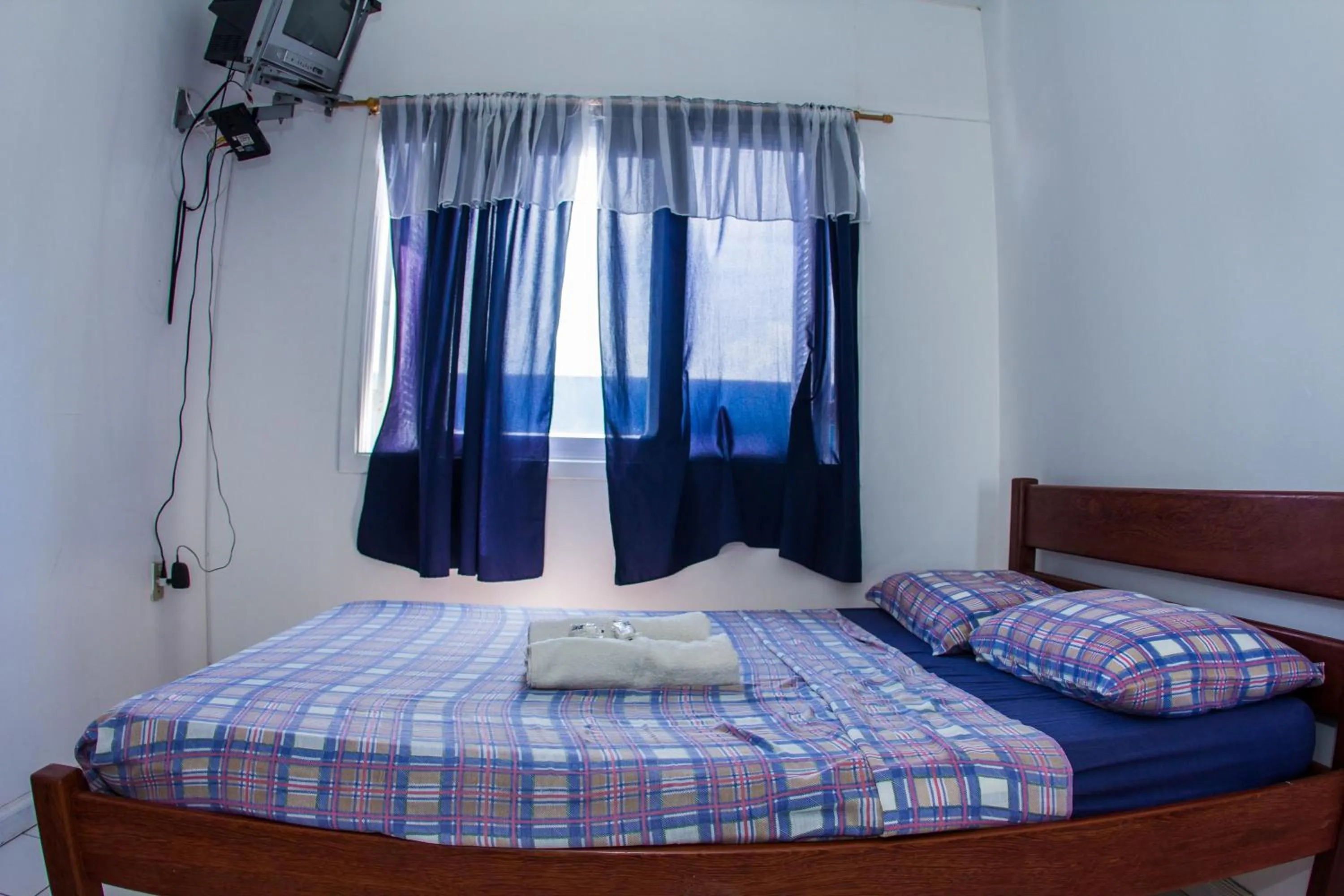 Bed in Hotel Recanto do Mar