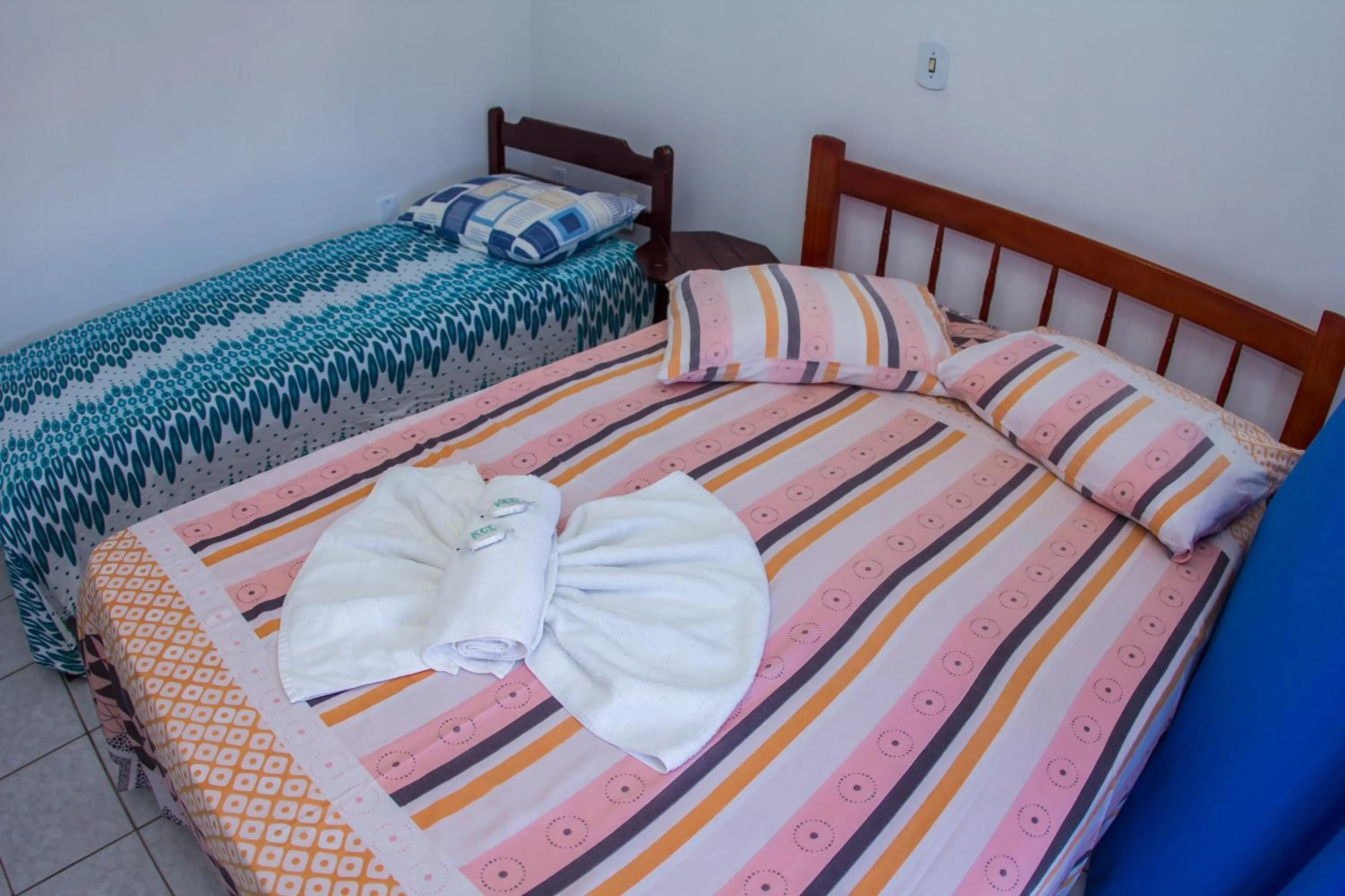 Bed in Hotel Recanto do Mar