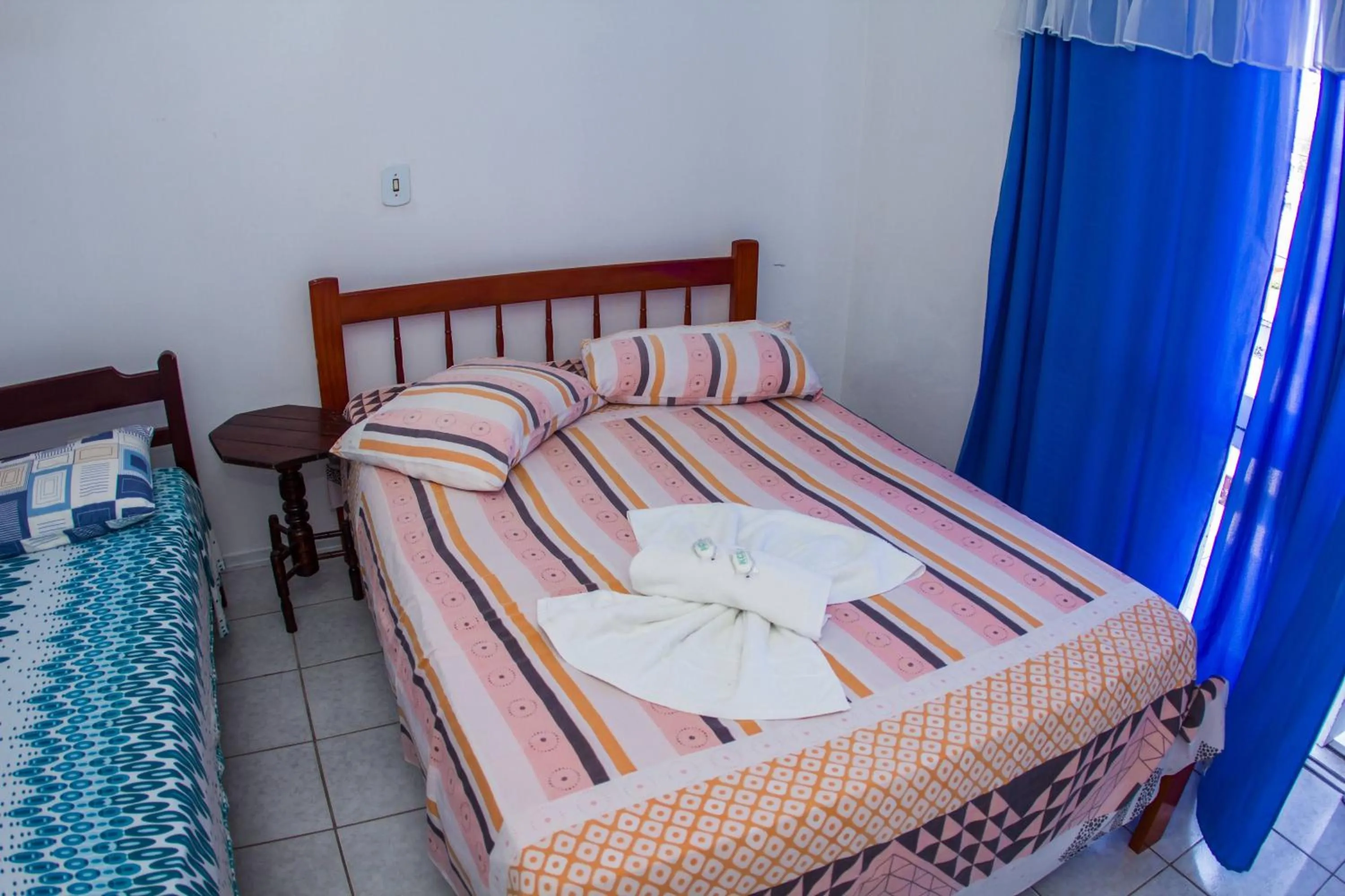 Bed in Hotel Recanto do Mar