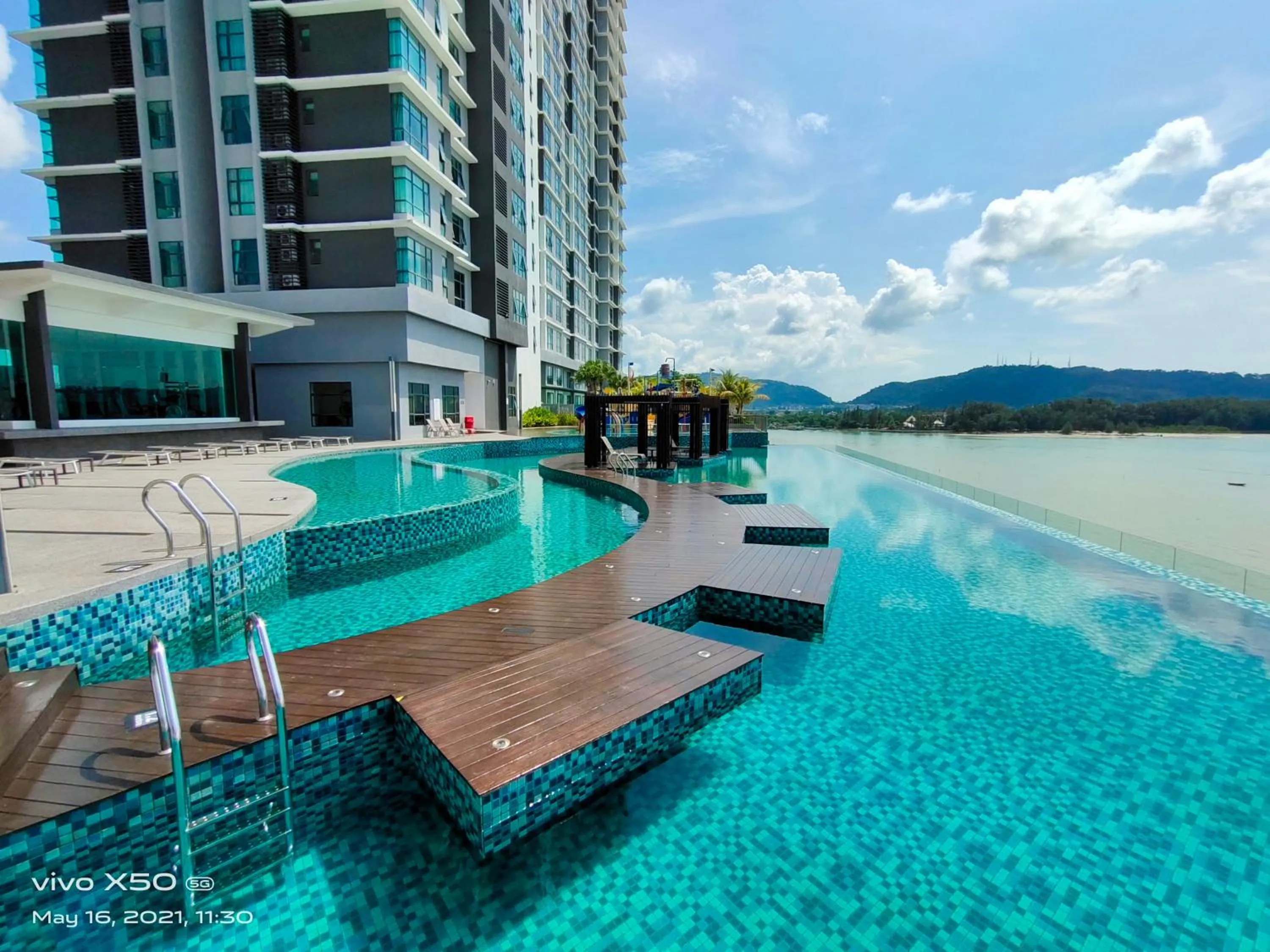 Swimming pool in Kuantan Imperium by Glex