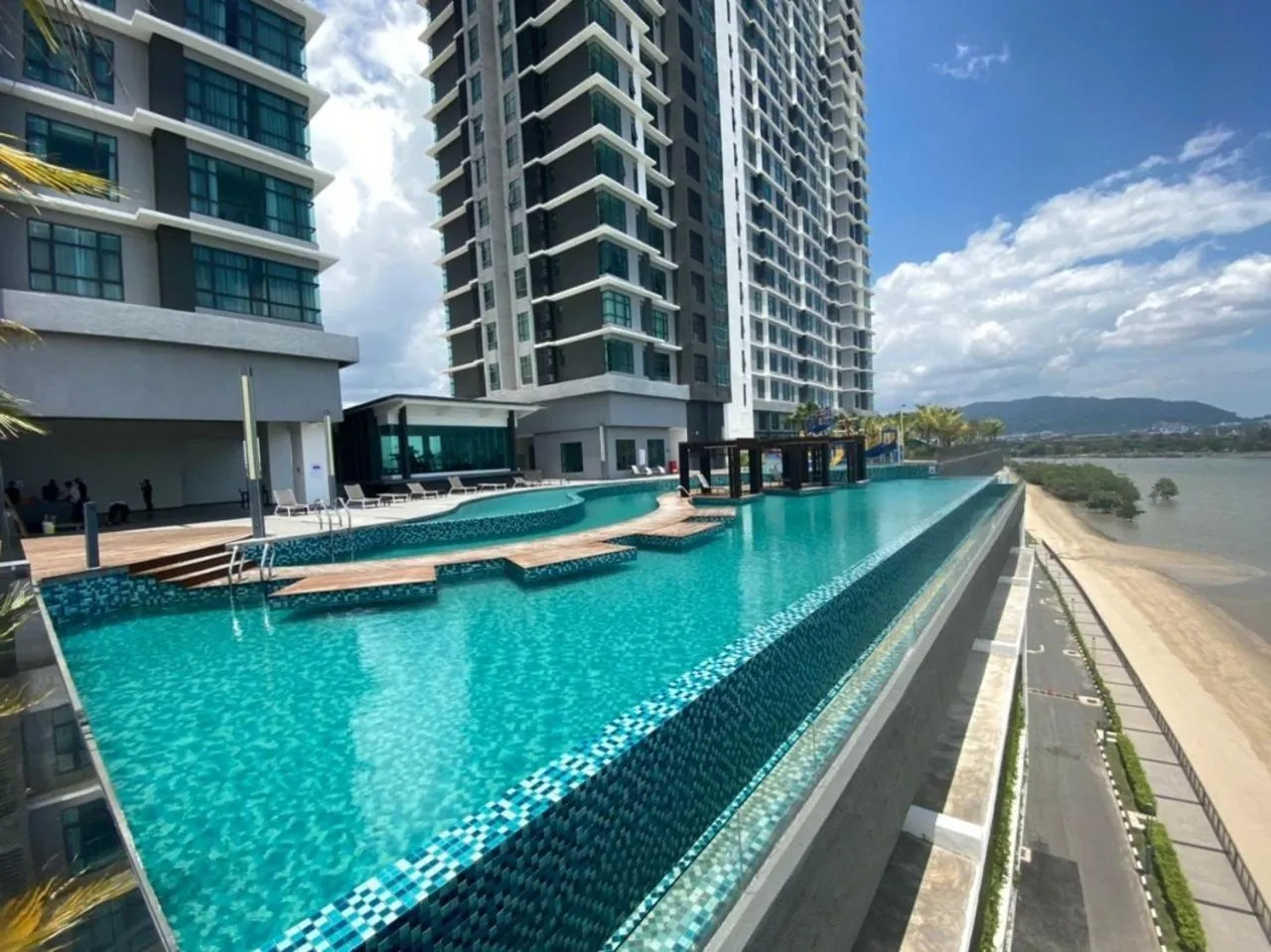 Swimming pool in Kuantan Imperium by Glex