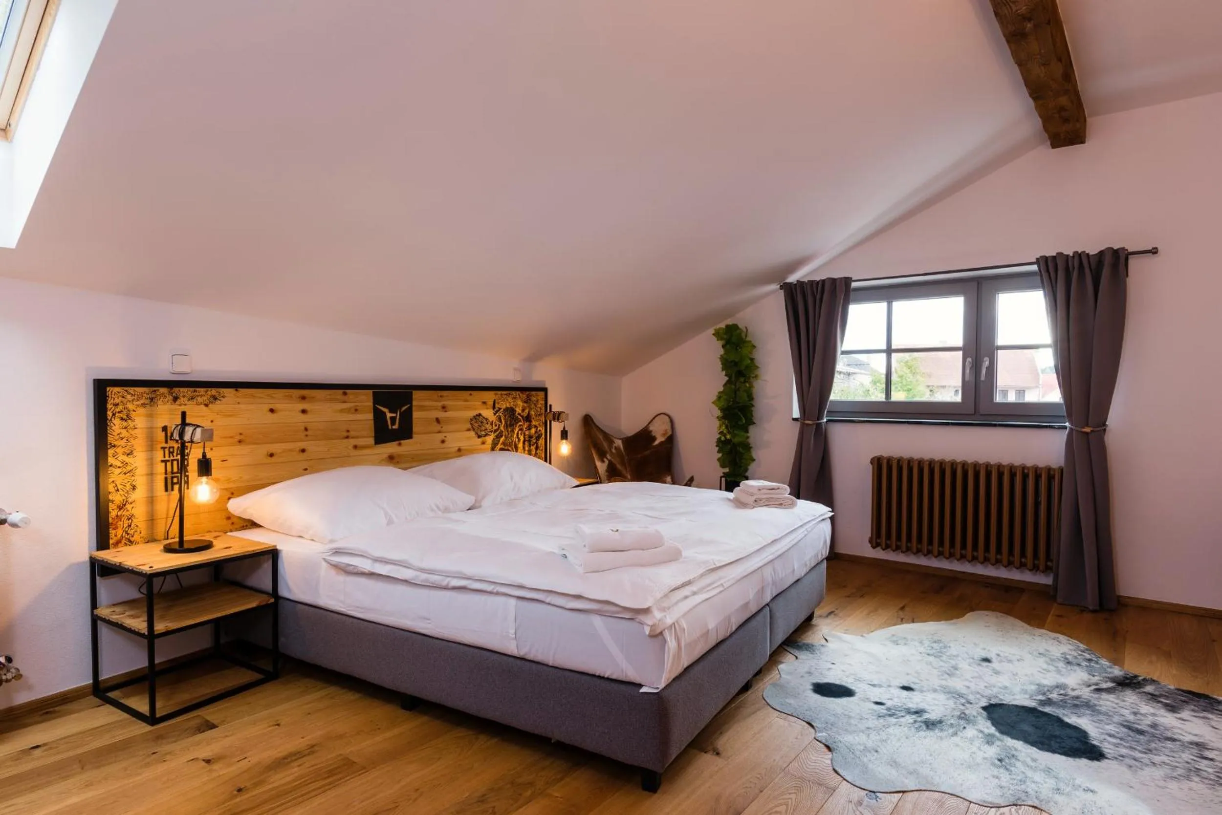 Bed in Pivní Hotel