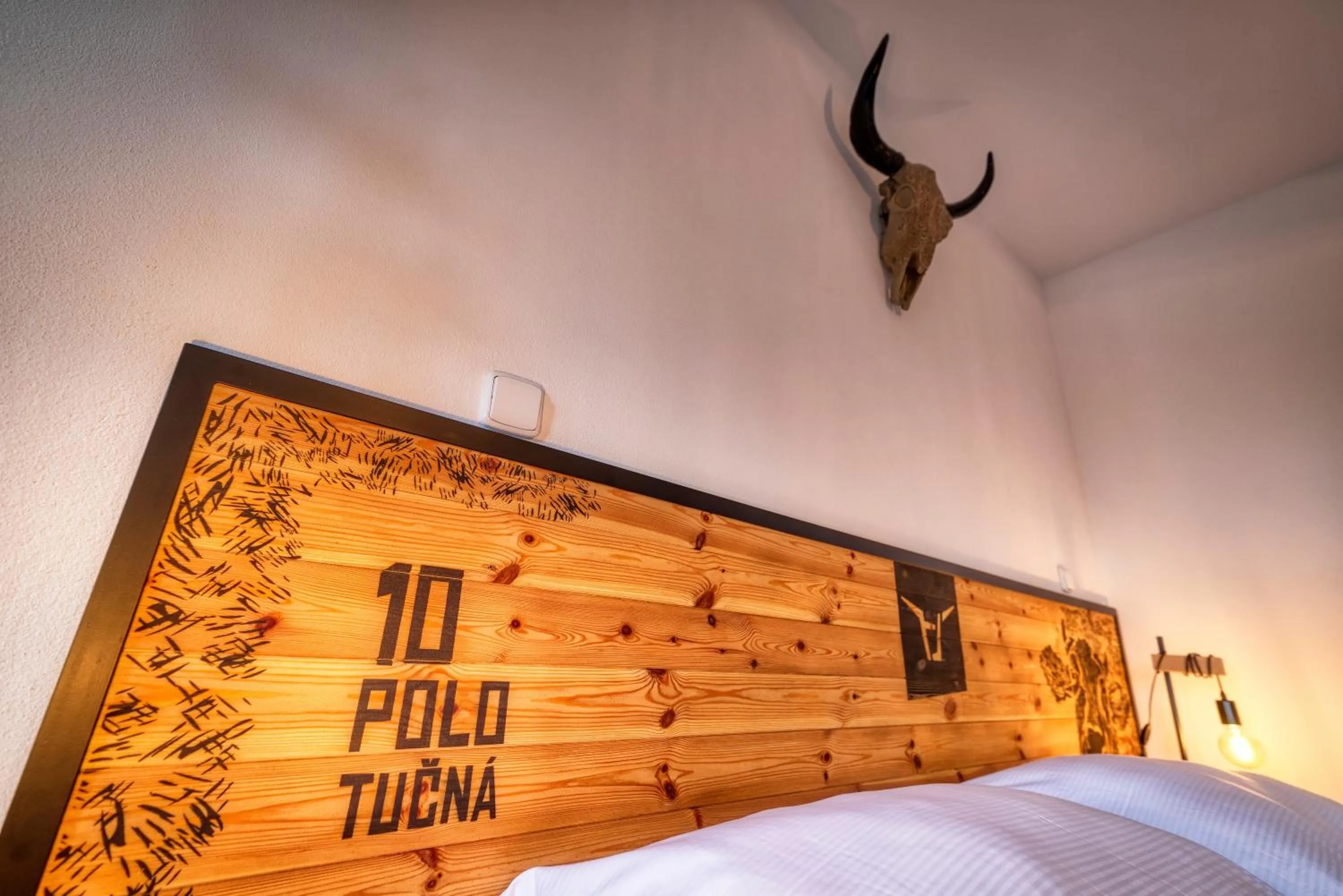 Bed in Pivní Hotel