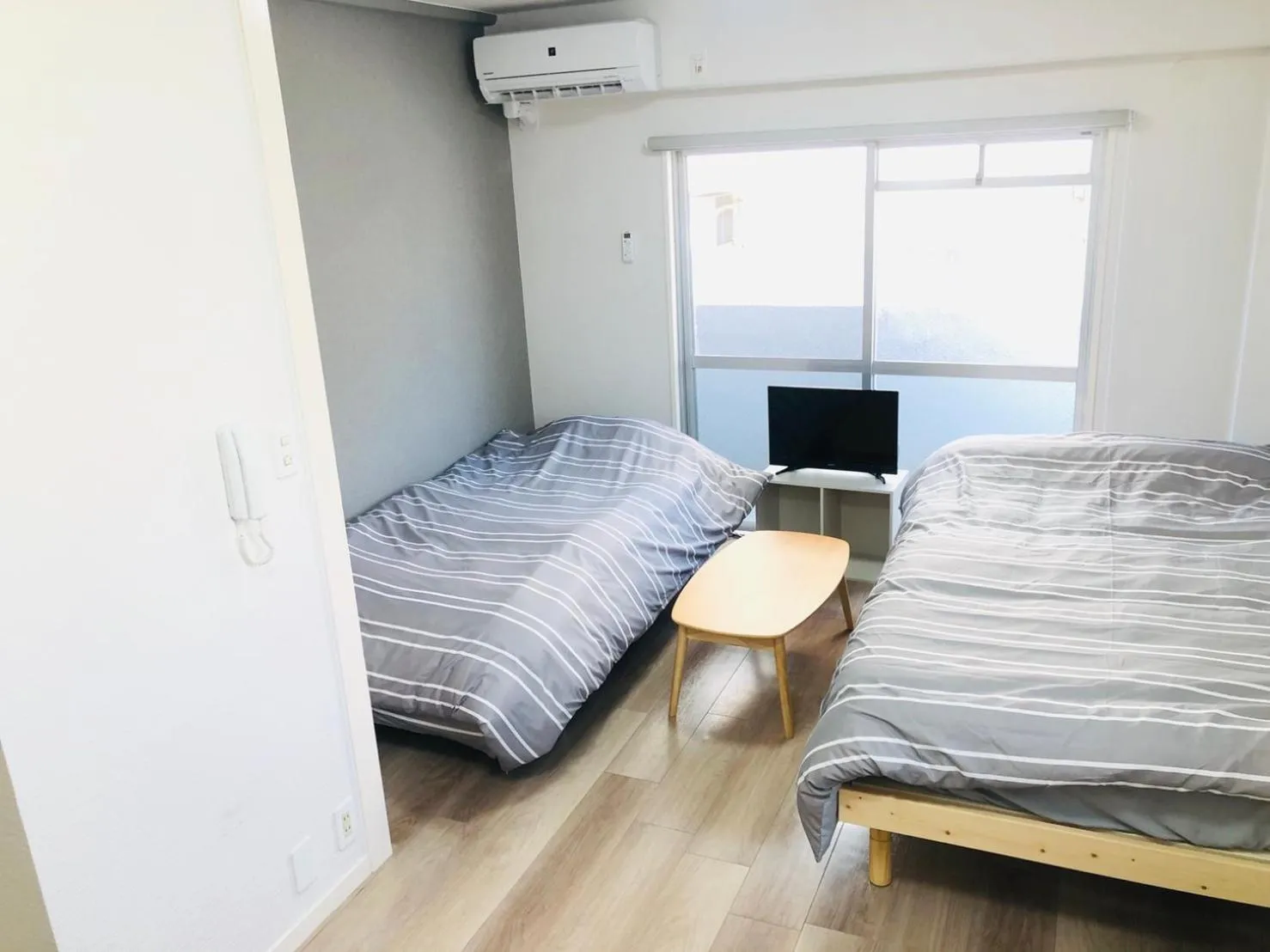 Bed in Hotel Peace Park Tokaichi by Tranova