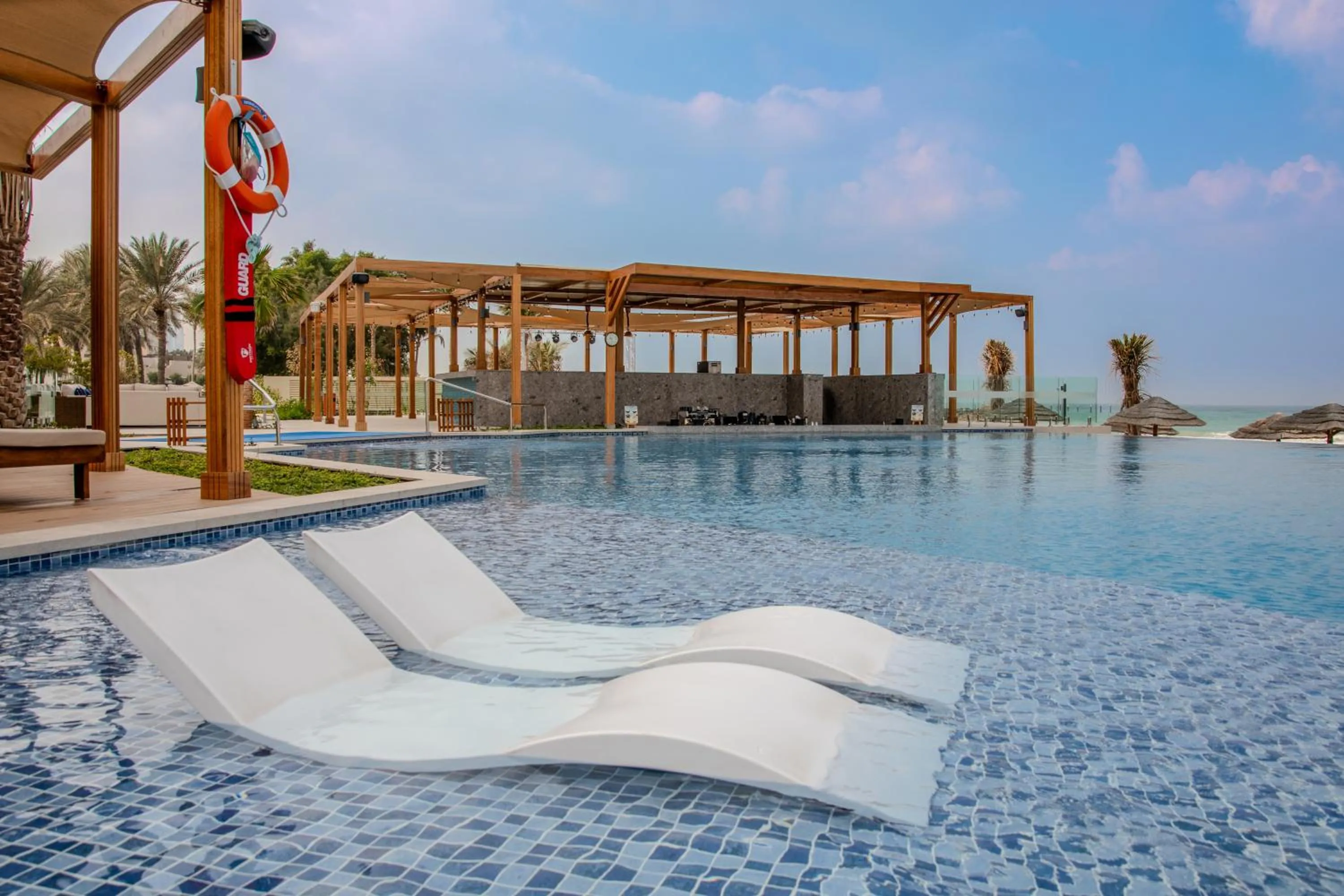 Swimming pool in Ajman Hotel & Villas by Blazon Hotels