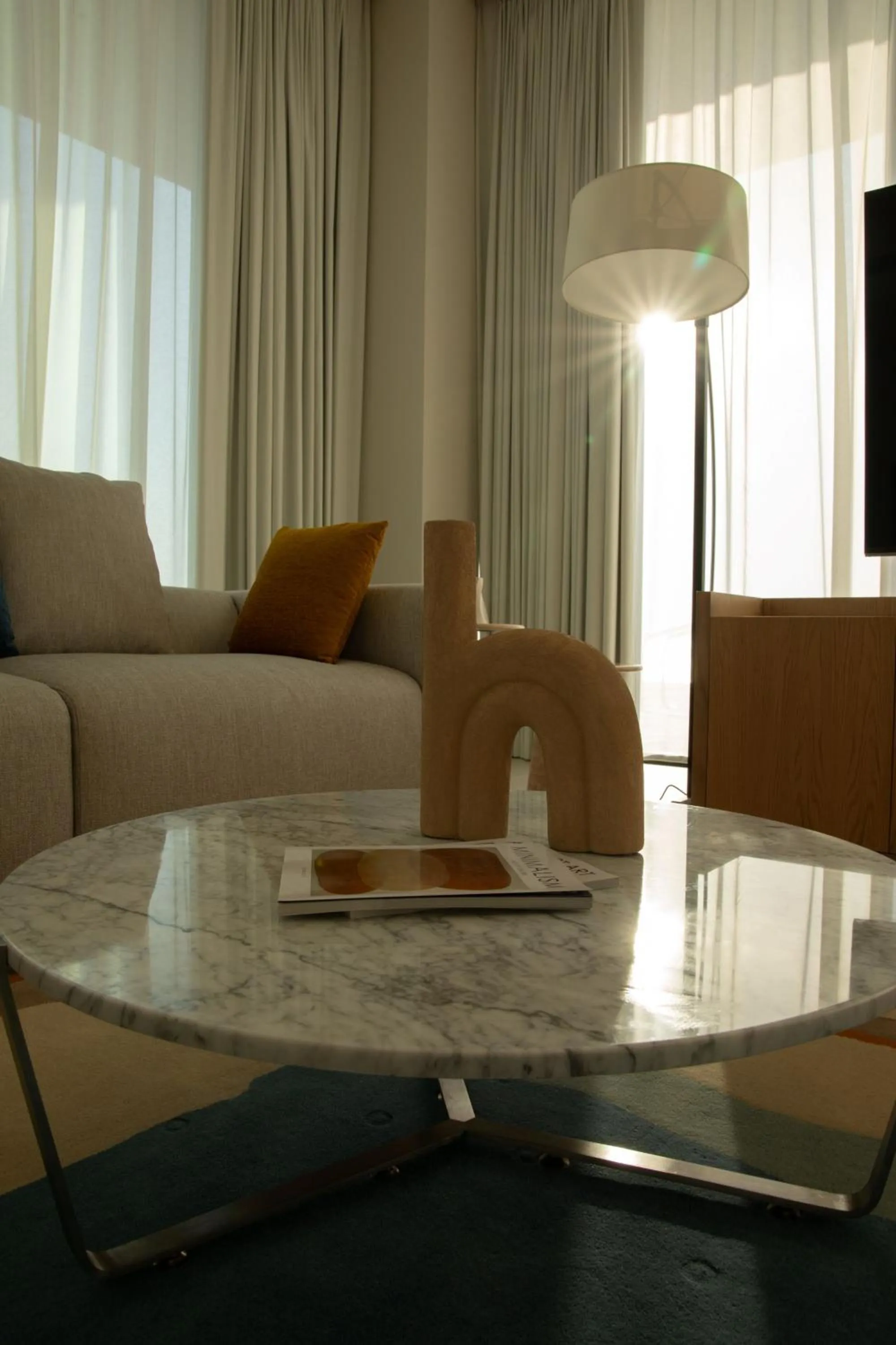 Living room in Ajman Hotel & Villas by Blazon Hotels