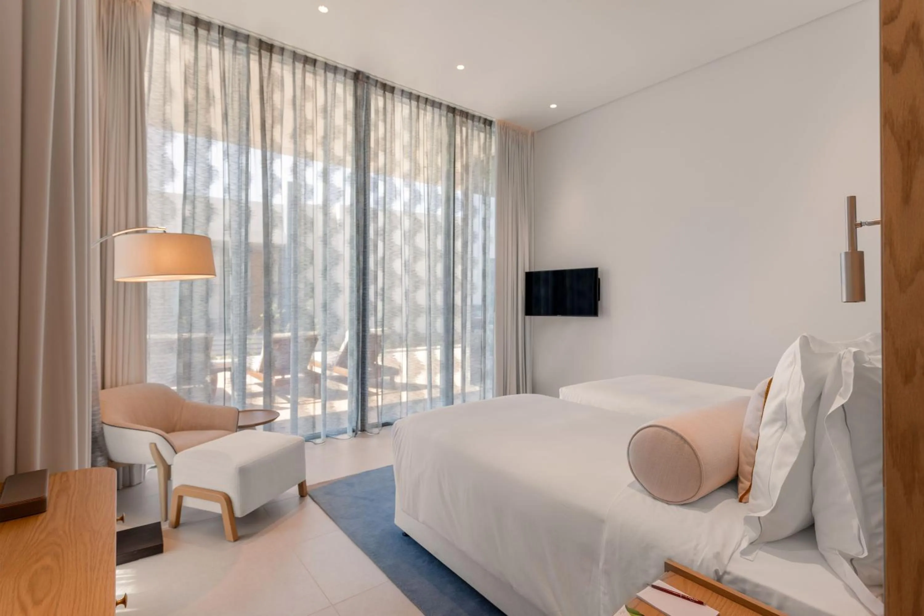 Bed in Ajman Hotel & Villas by Blazon Hotels