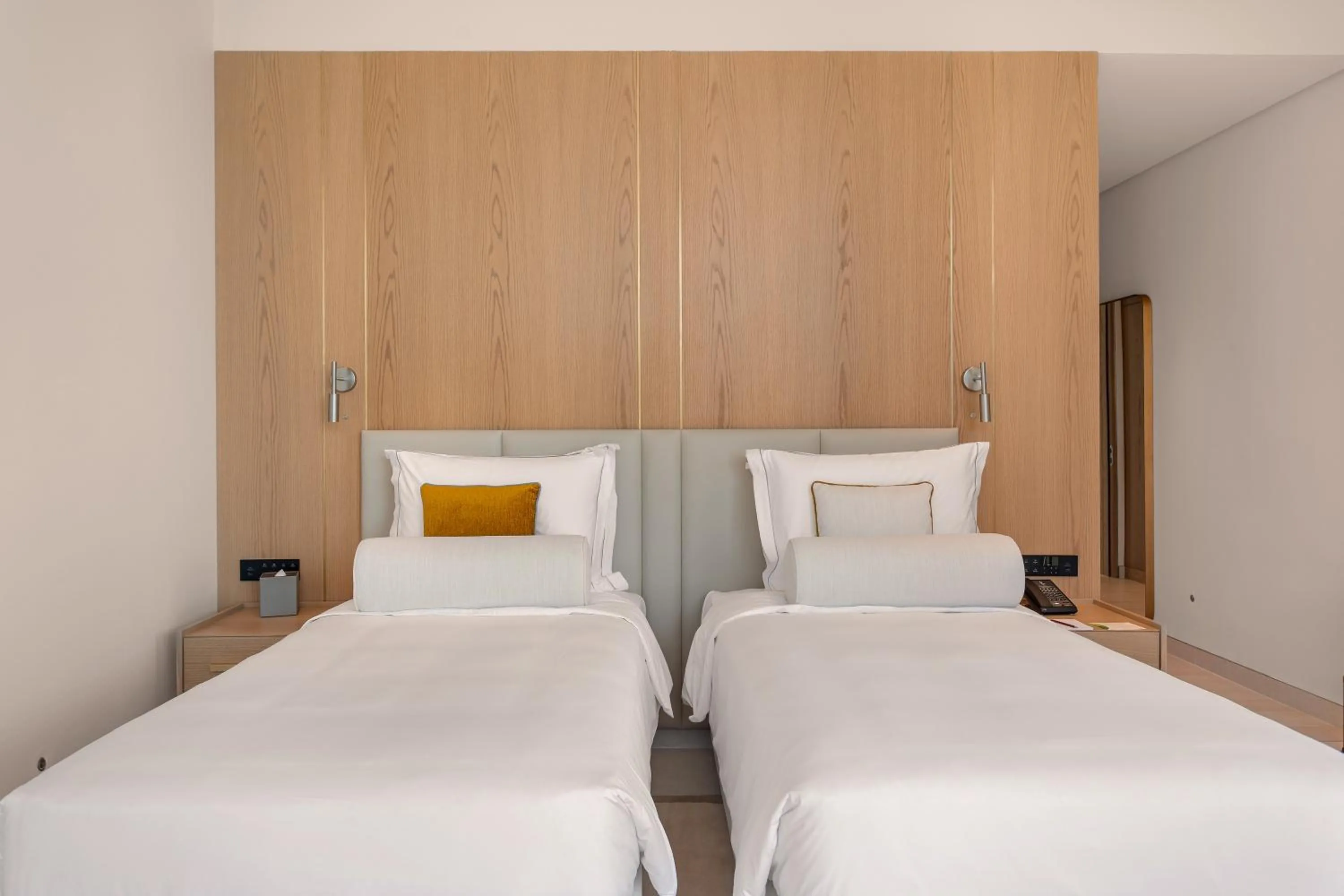 Bed in Ajman Hotel & Villas by Blazon Hotels