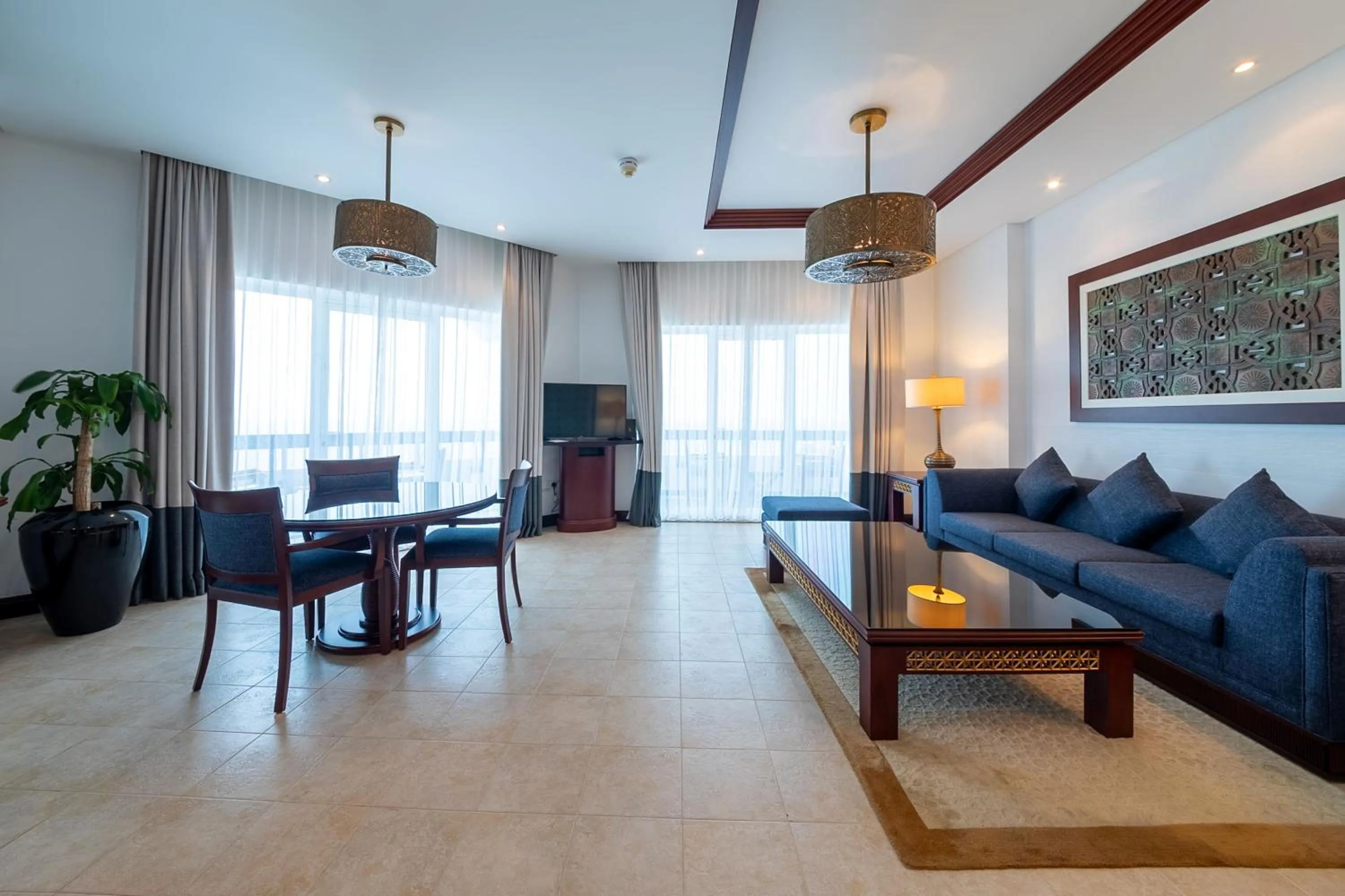 Living room in Ajman Hotel & Villas by Blazon Hotels