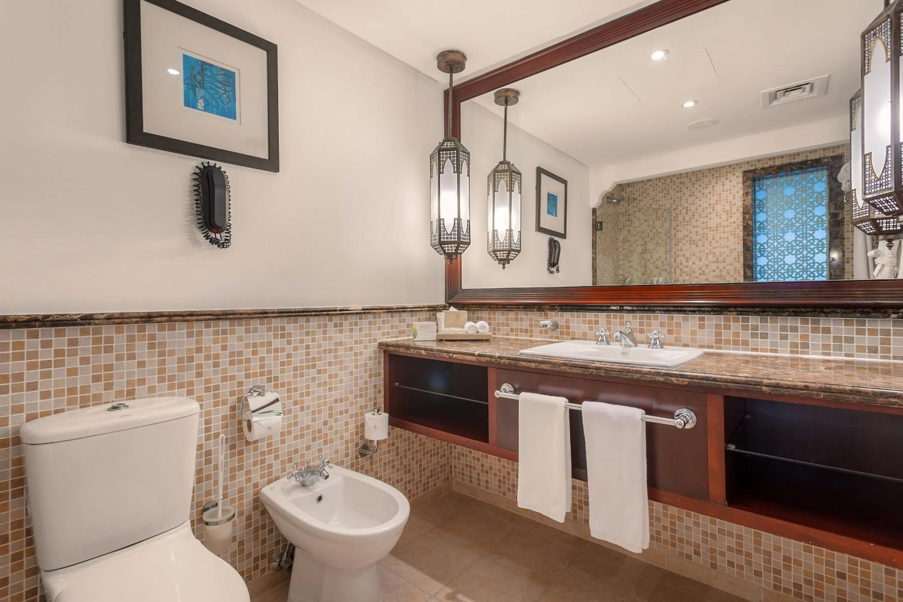 Toilet in Ajman Hotel & Villas by Blazon Hotels