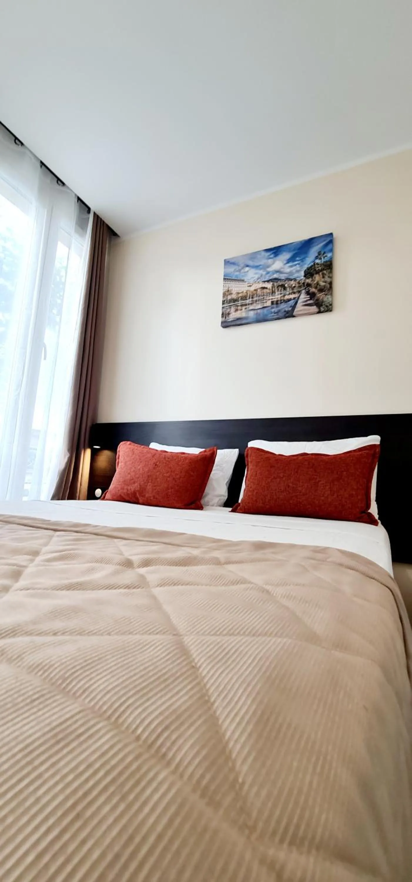 Bed in Evelia Hotels