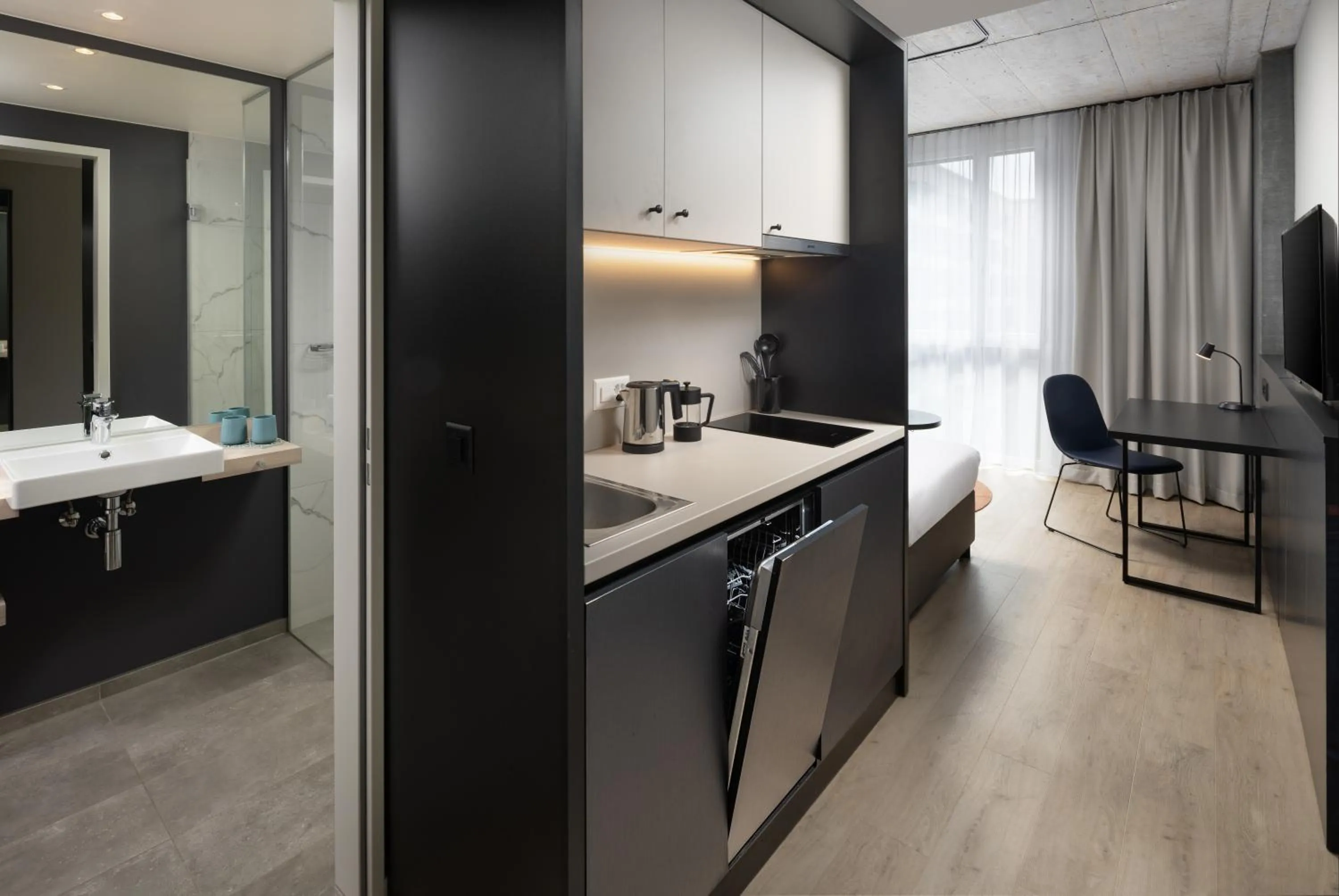 Kitchen or kitchenette in Radisson Hotel & Suites Zurich