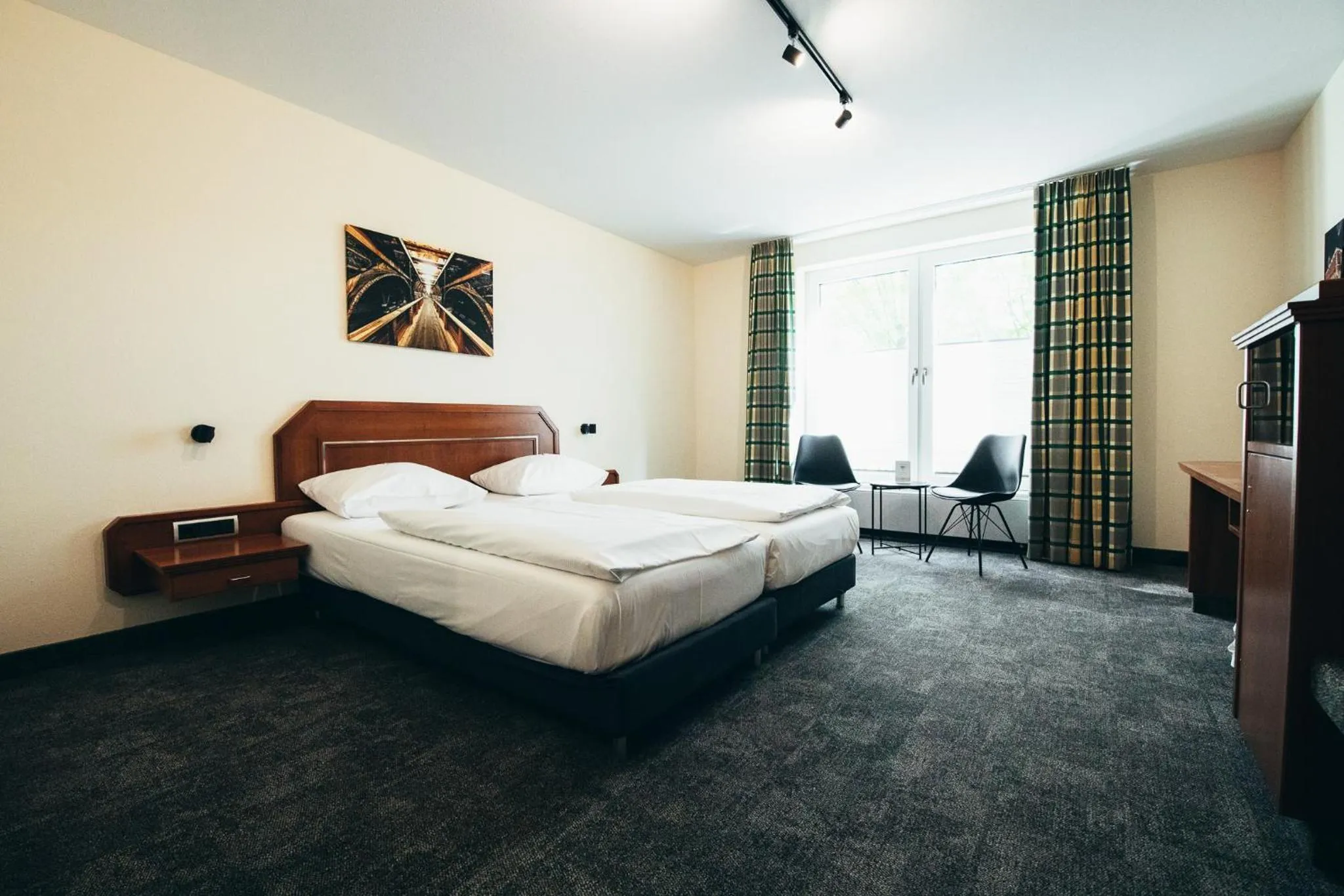 Photo of the whole room, Bed in Maifeld Sport- und Tagungshotel