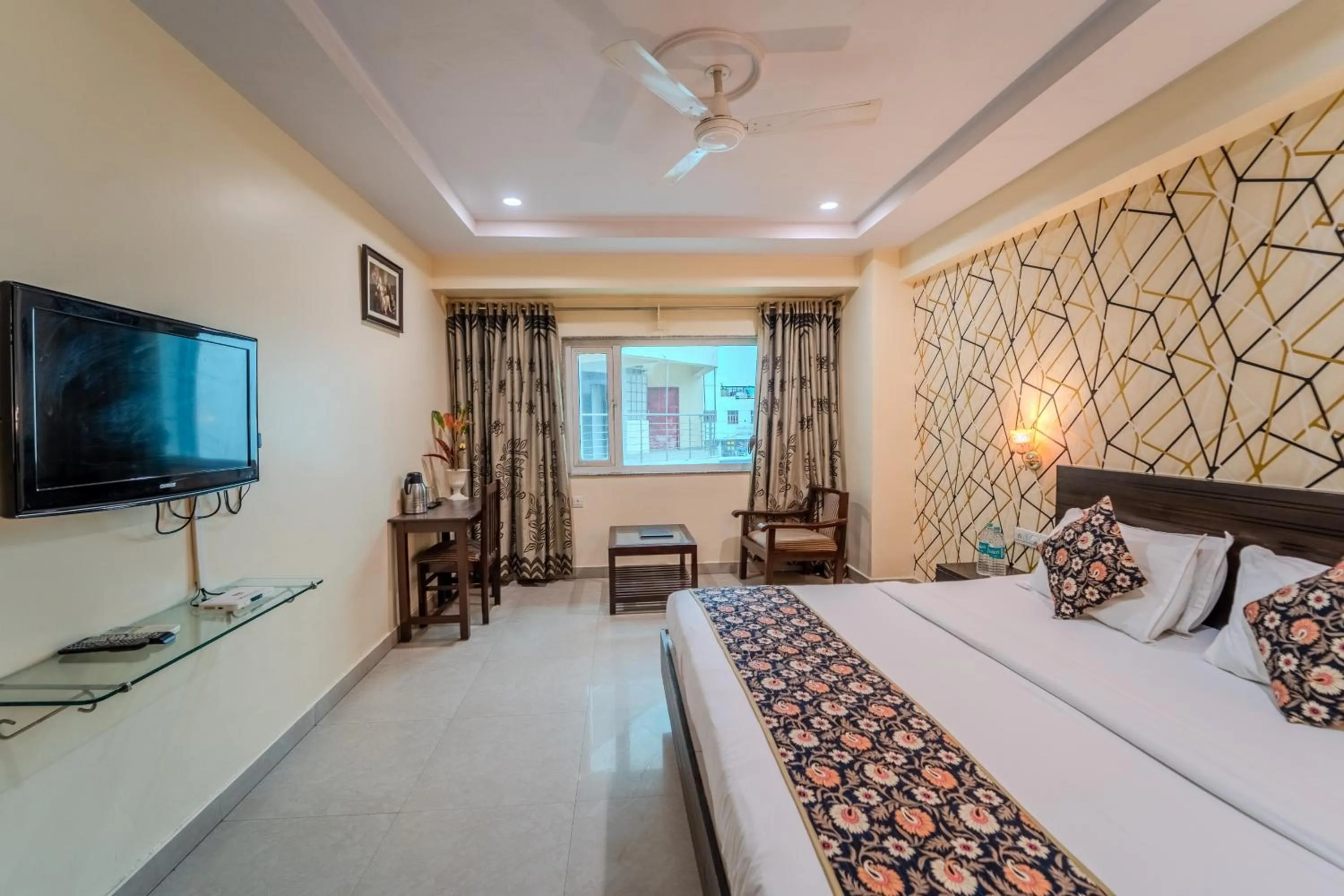 Photo of the whole room, Bed in Hotel City Square By KeyMagics