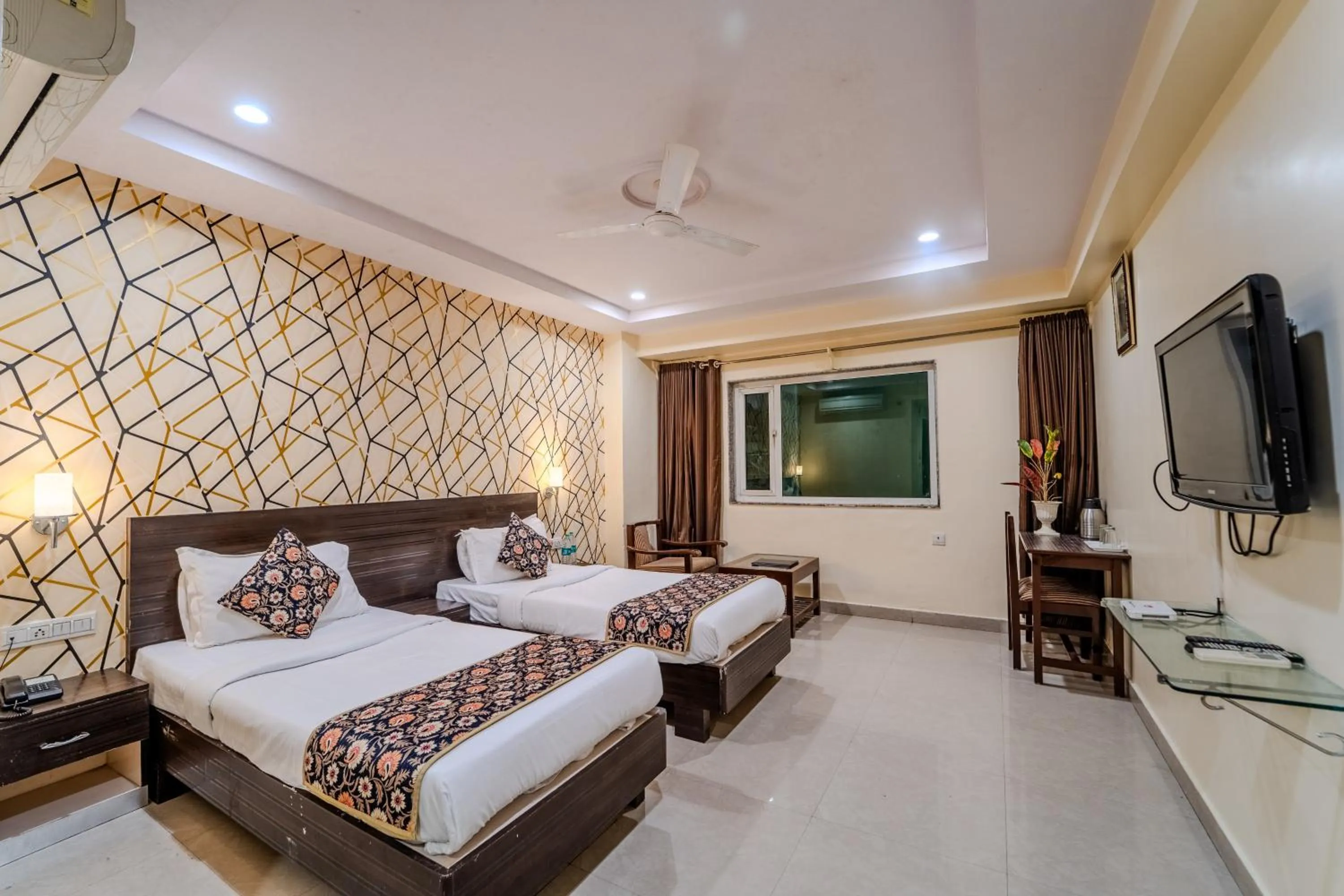 Photo of the whole room, Bed in Hotel City Square By KeyMagics